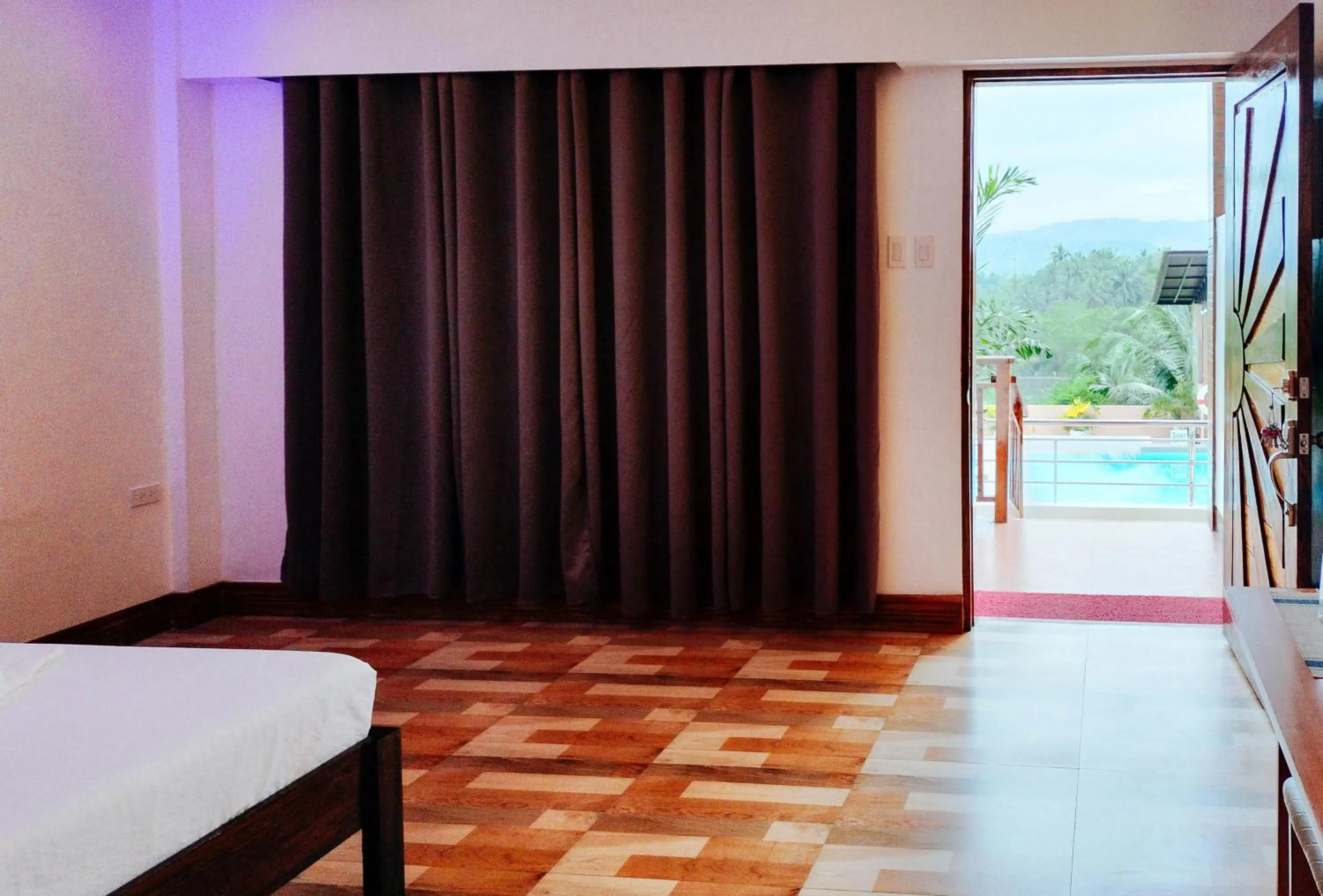 Photo of the whole room in RedDoorz @ Sun Kissed Resort Guindulman