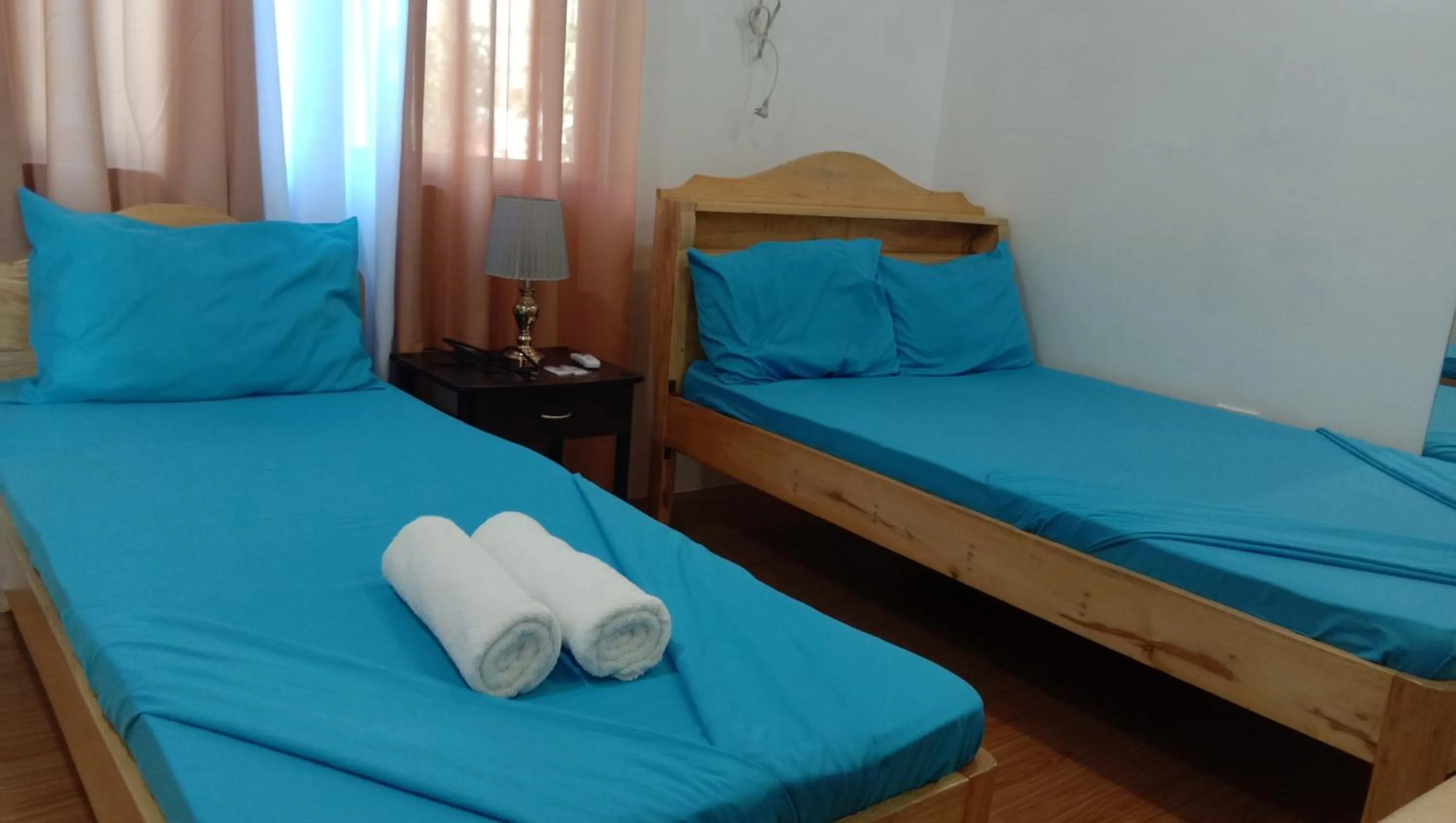 Bed in RNA Guesthouse