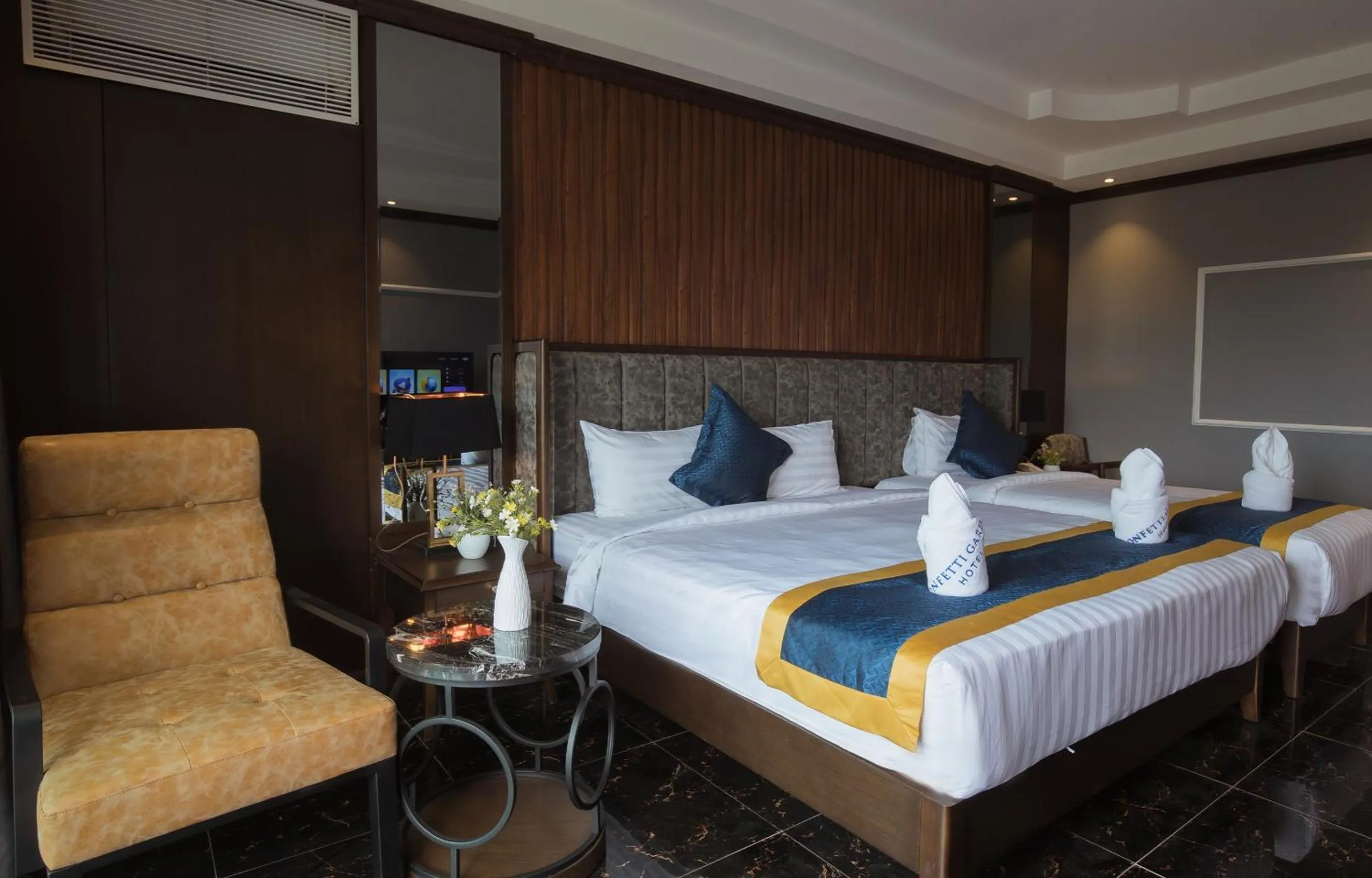 Bed in Confetti Garden Hotel