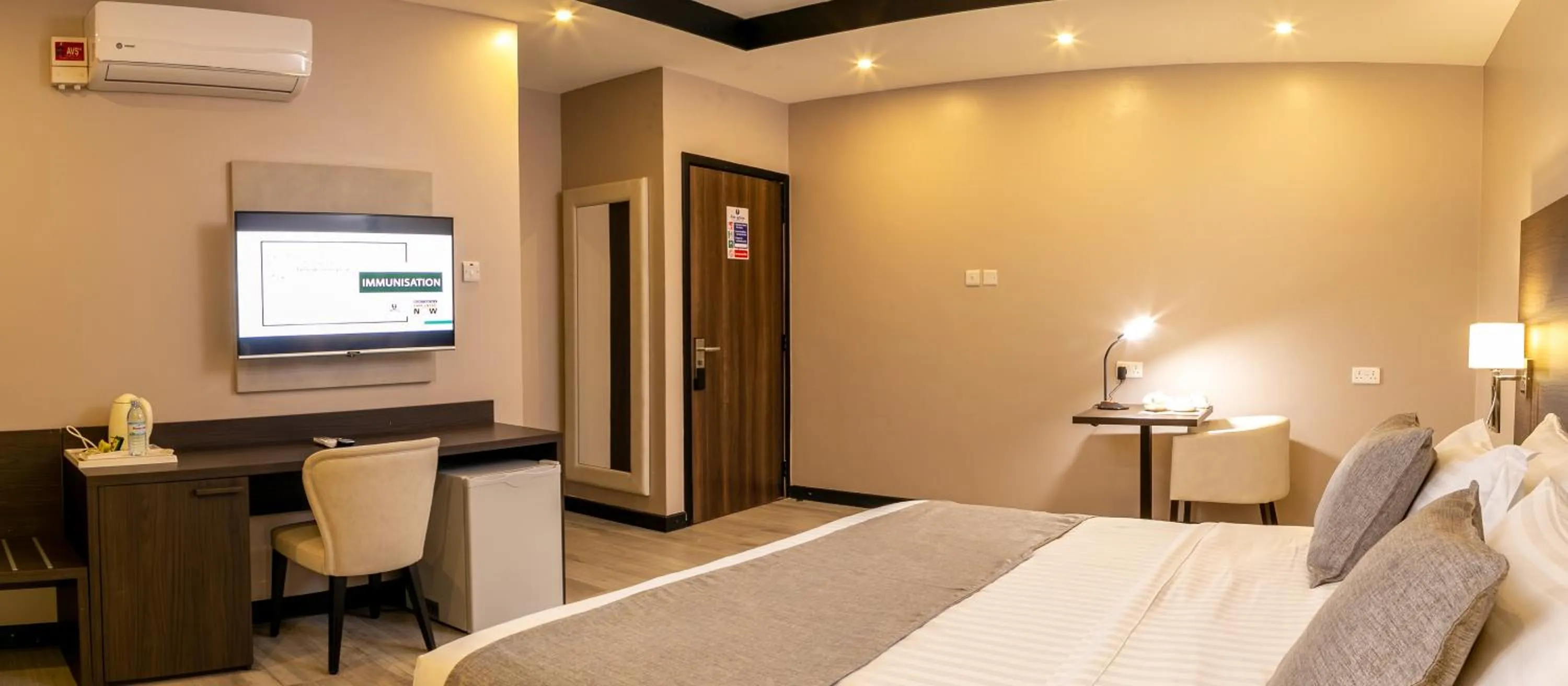 air conditioner, Bed in Source of The Nile Hotel- Namanve Branch