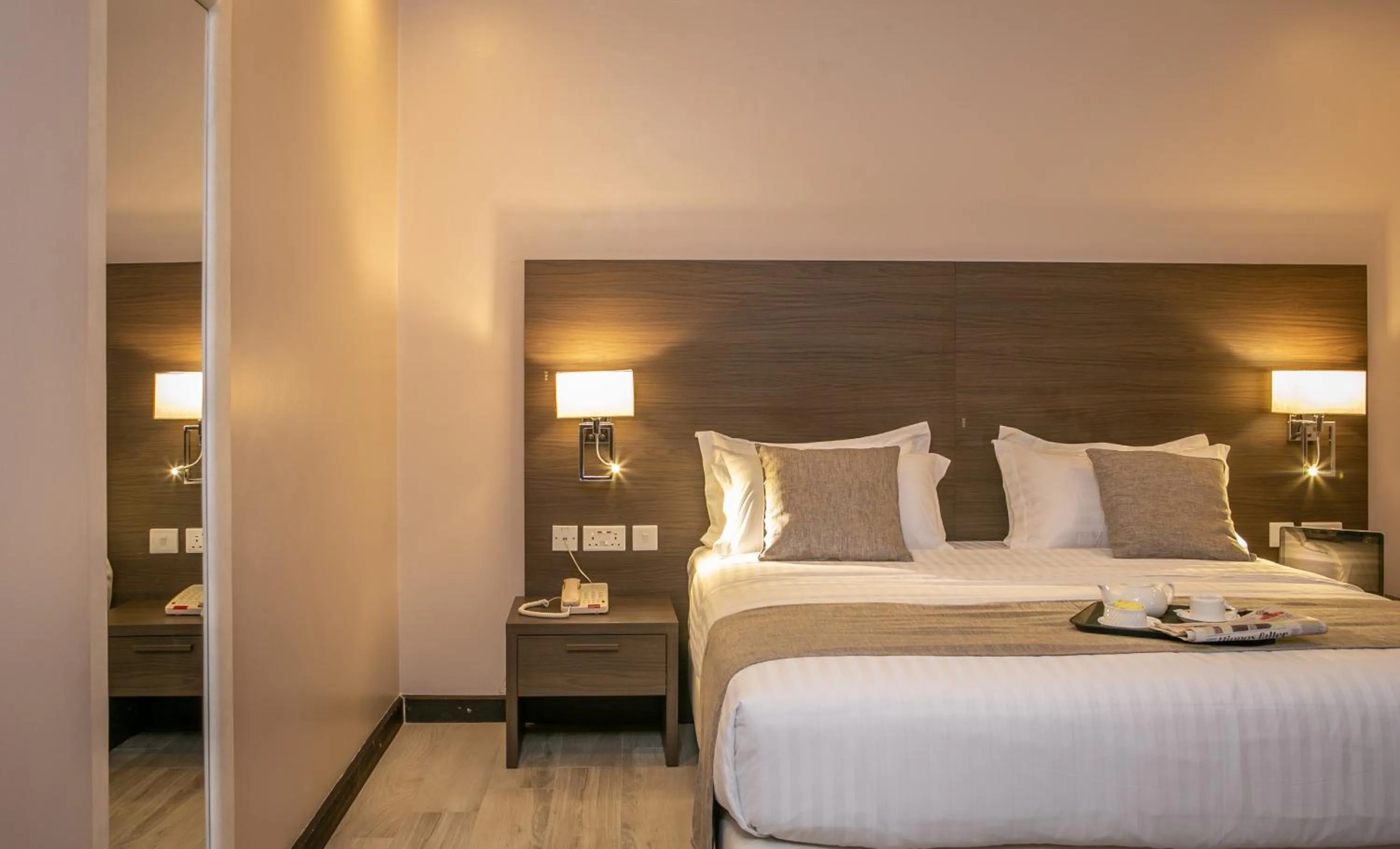 air conditioner, Bed in Source of The Nile Hotel- Namanve Branch