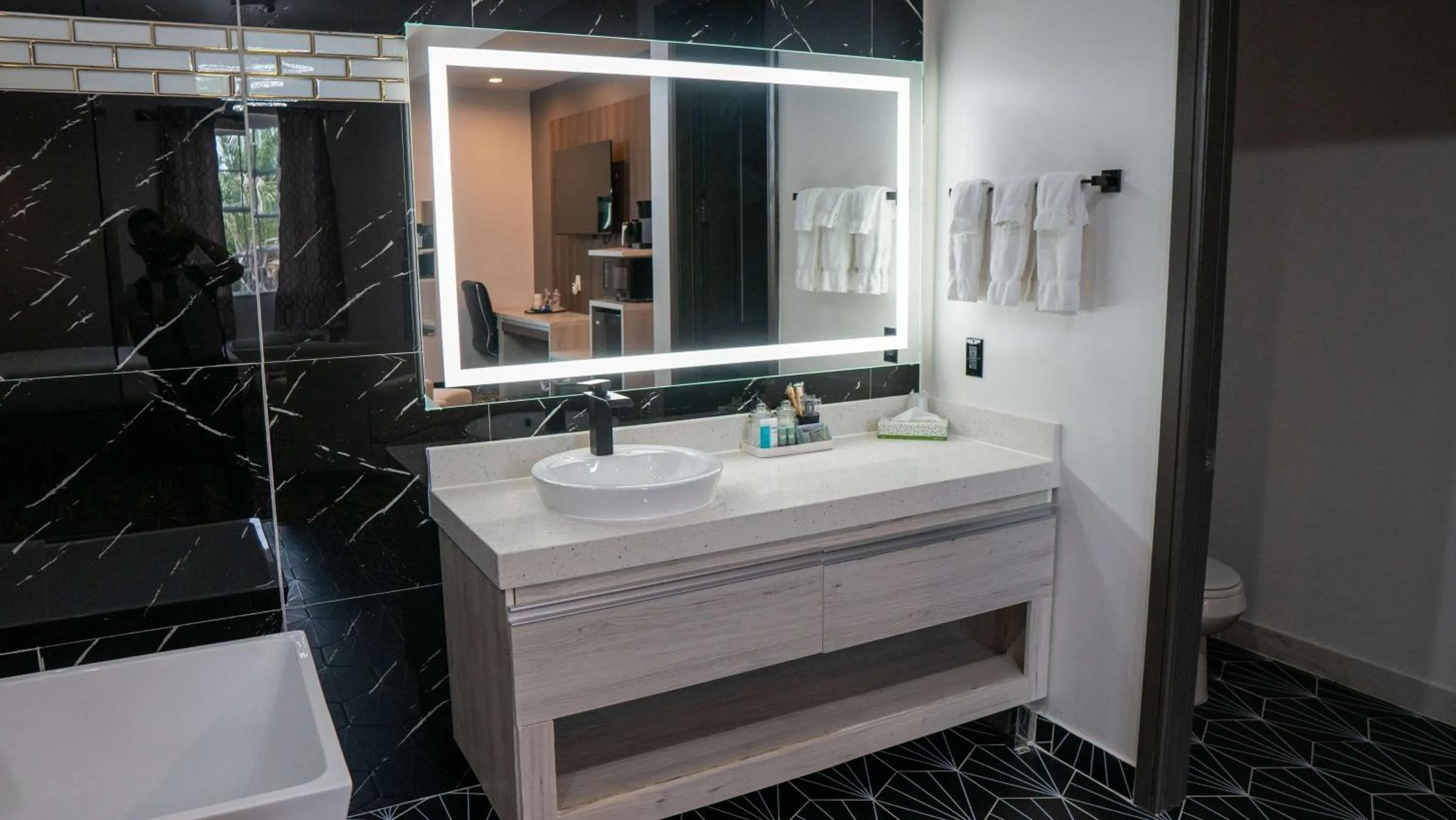 Bathroom in Comfeeni Inn and Suites