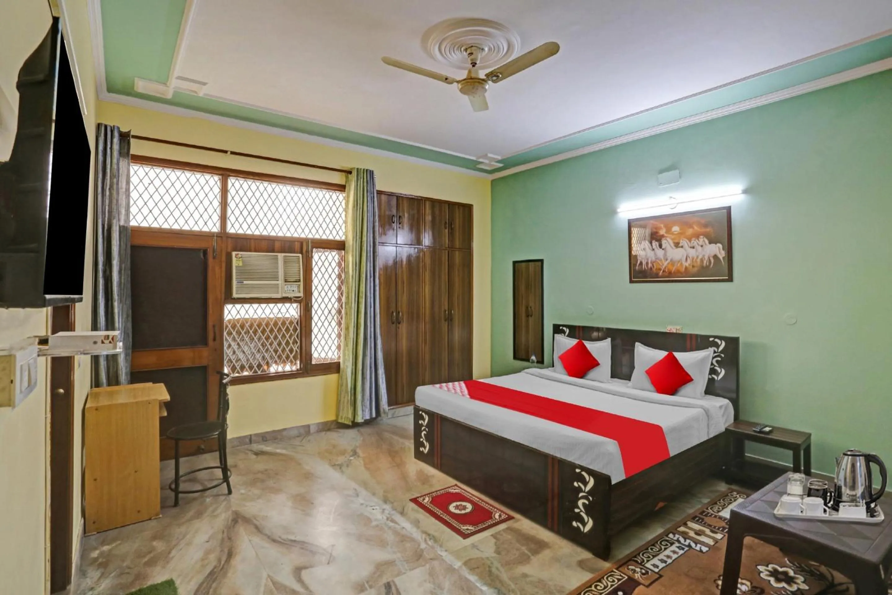 Bedroom in OYO Flagship 81046 Royal Retreat