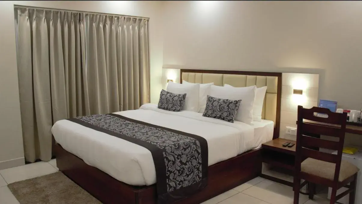 Deluxe King Room in Pride Biznotel Canopus, Digha Deluxe King Room in Pride Biznotel Canopus, Digha