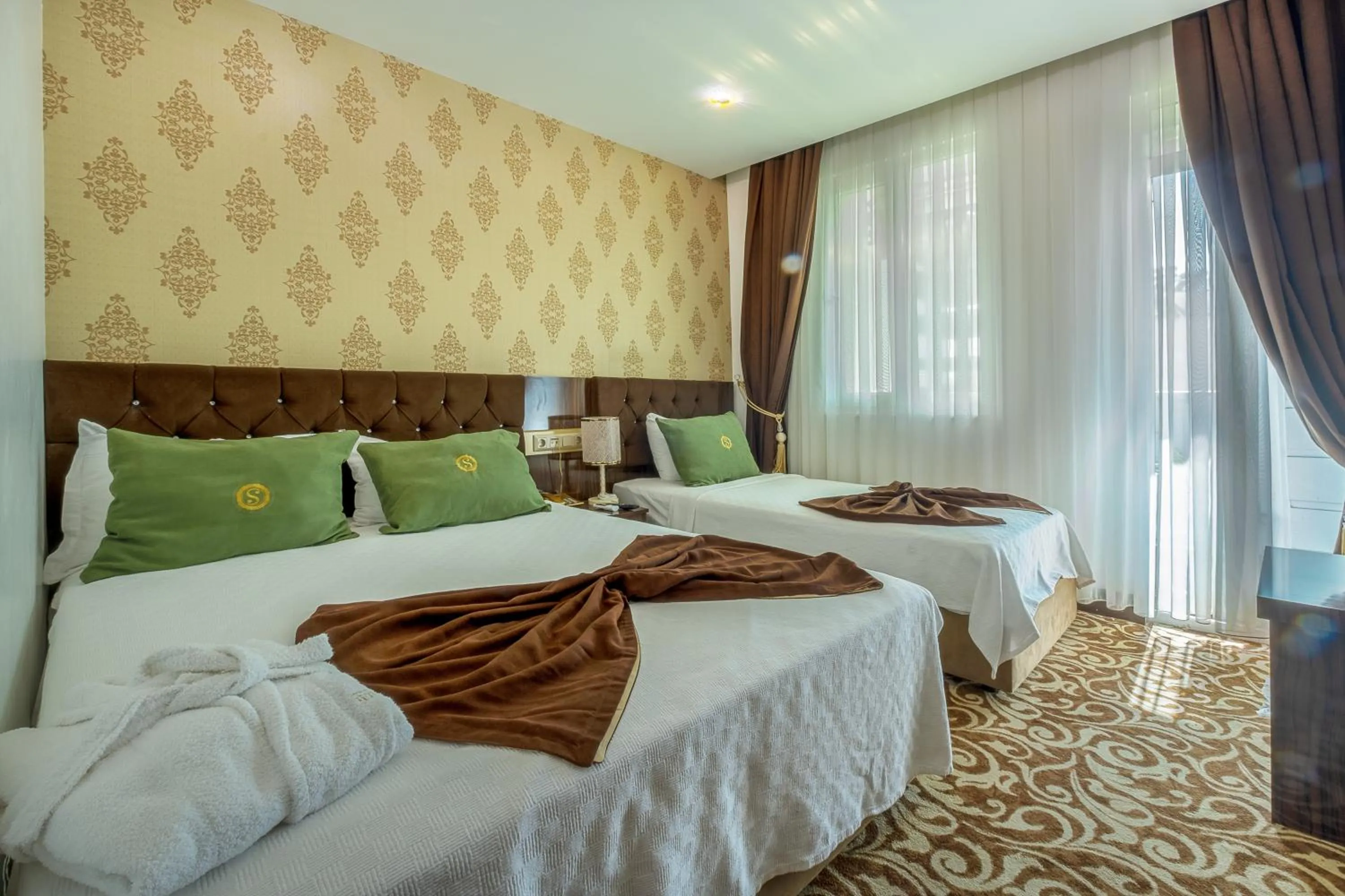 Bed in HOTEL S WHITE