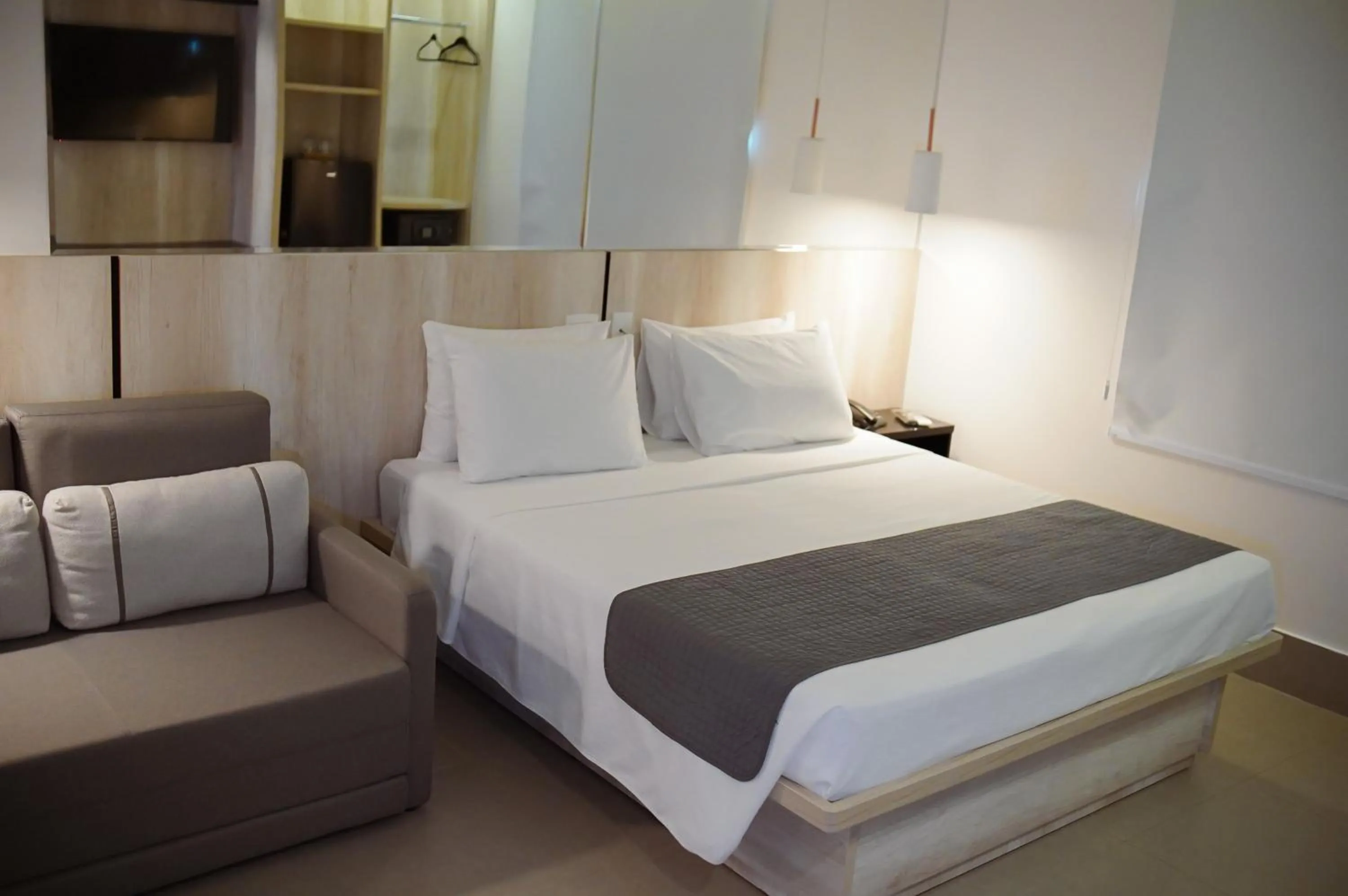 Bed in Hotel Black Inn Flamboyant