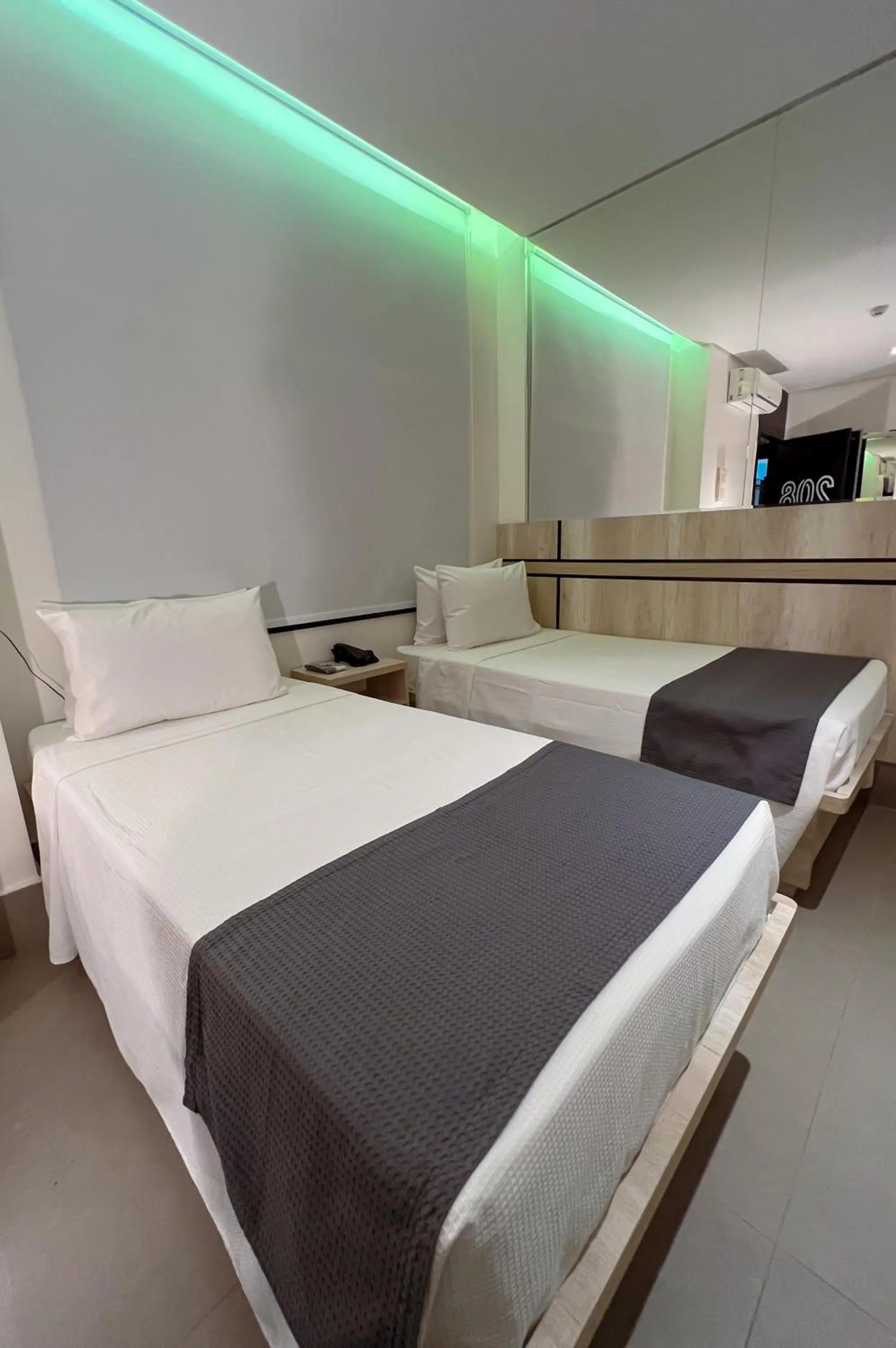 Bed in Hotel Black Inn Flamboyant