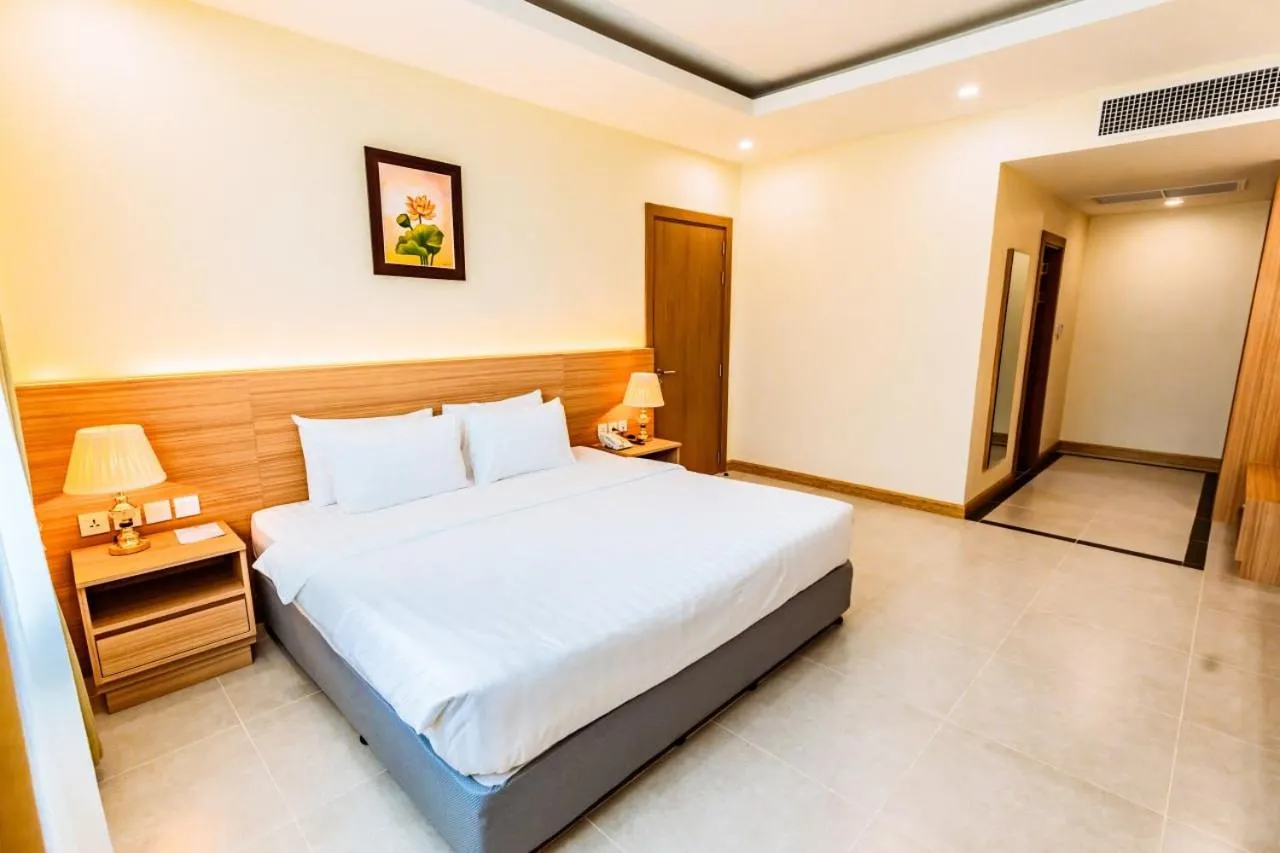 Bed in Dynasty Casino Hotel