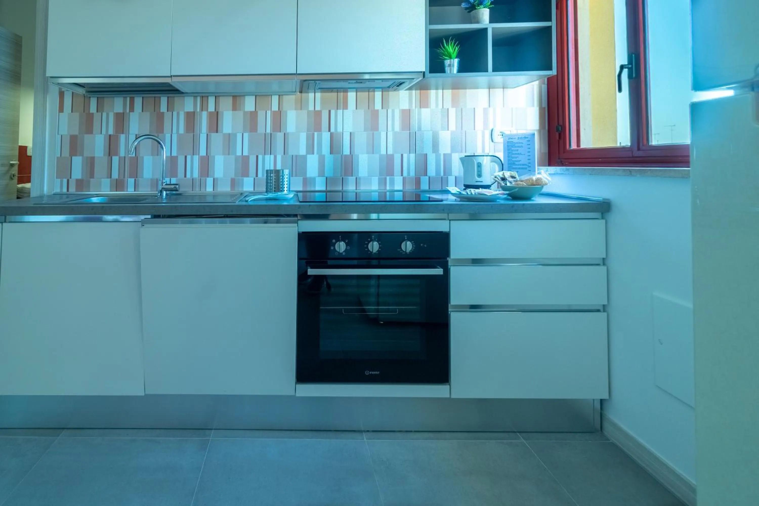 Kitchen or kitchenette in Appartamenti Craulo