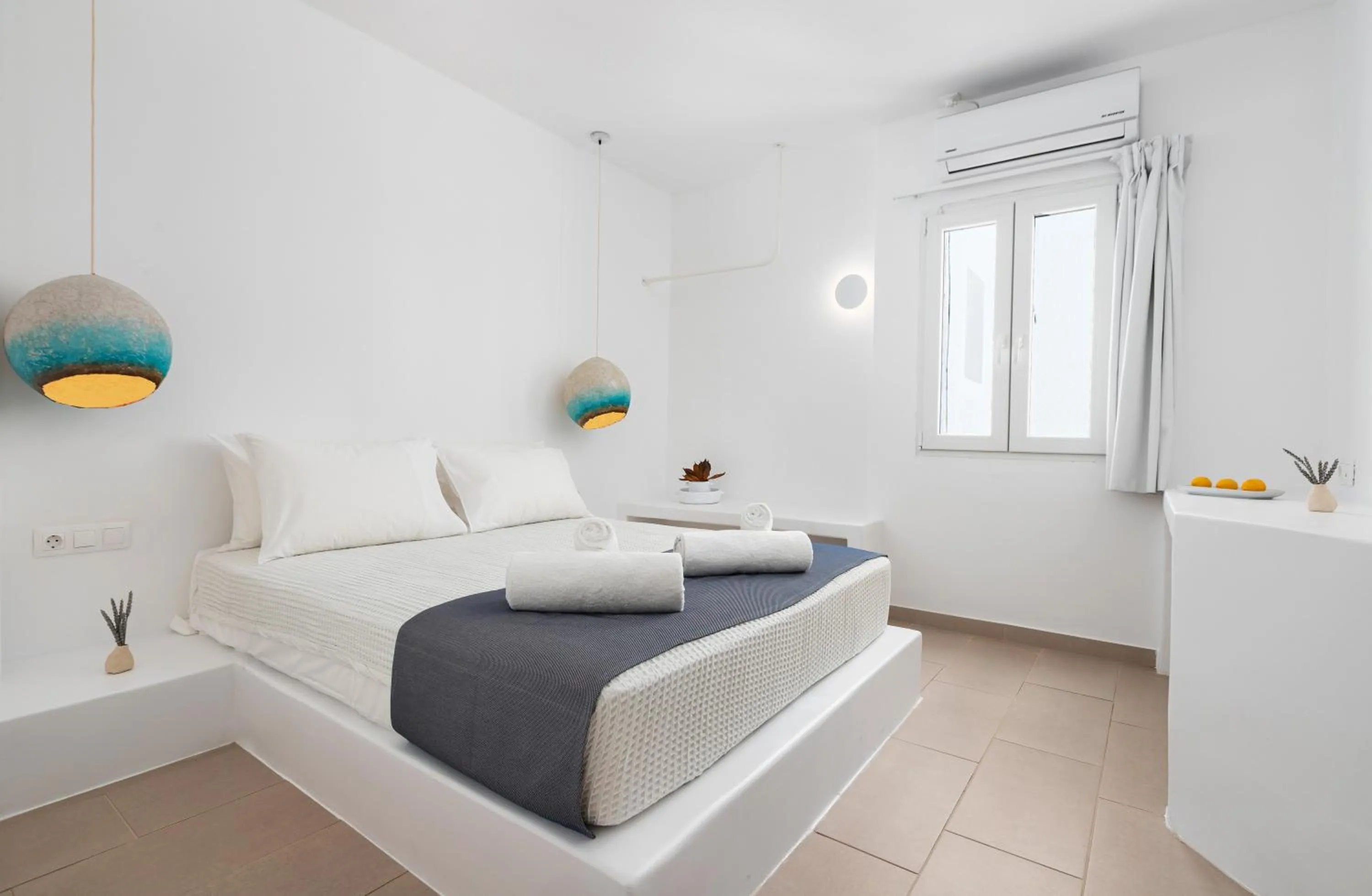 Bed in VOCA HOTEL & SUITES