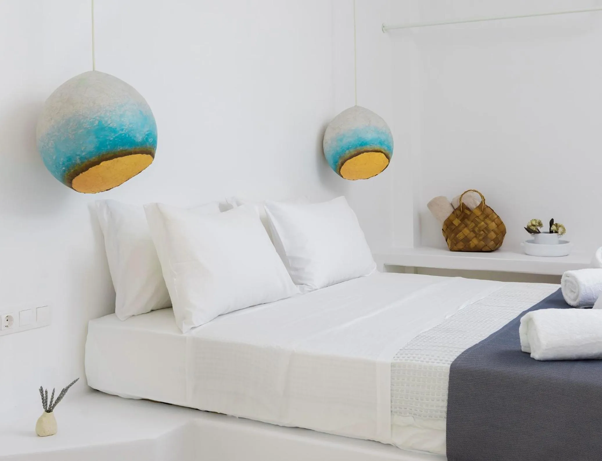 Bed in VOCA HOTEL & SUITES