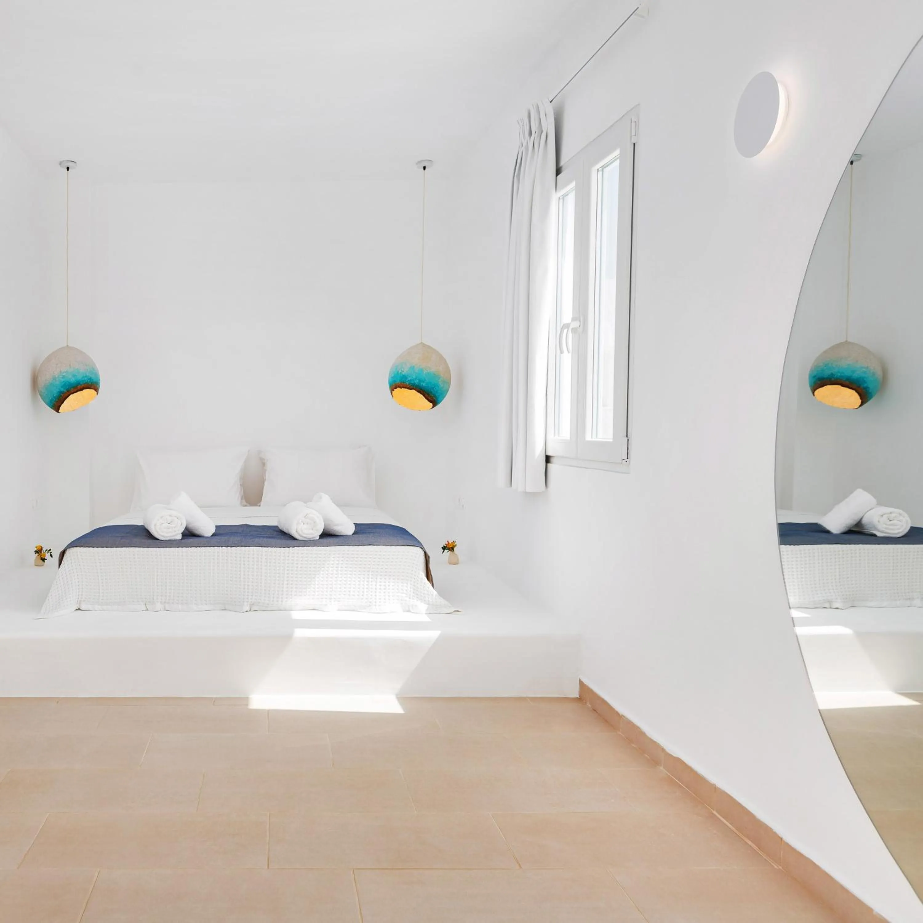 Bed in VOCA HOTEL & SUITES