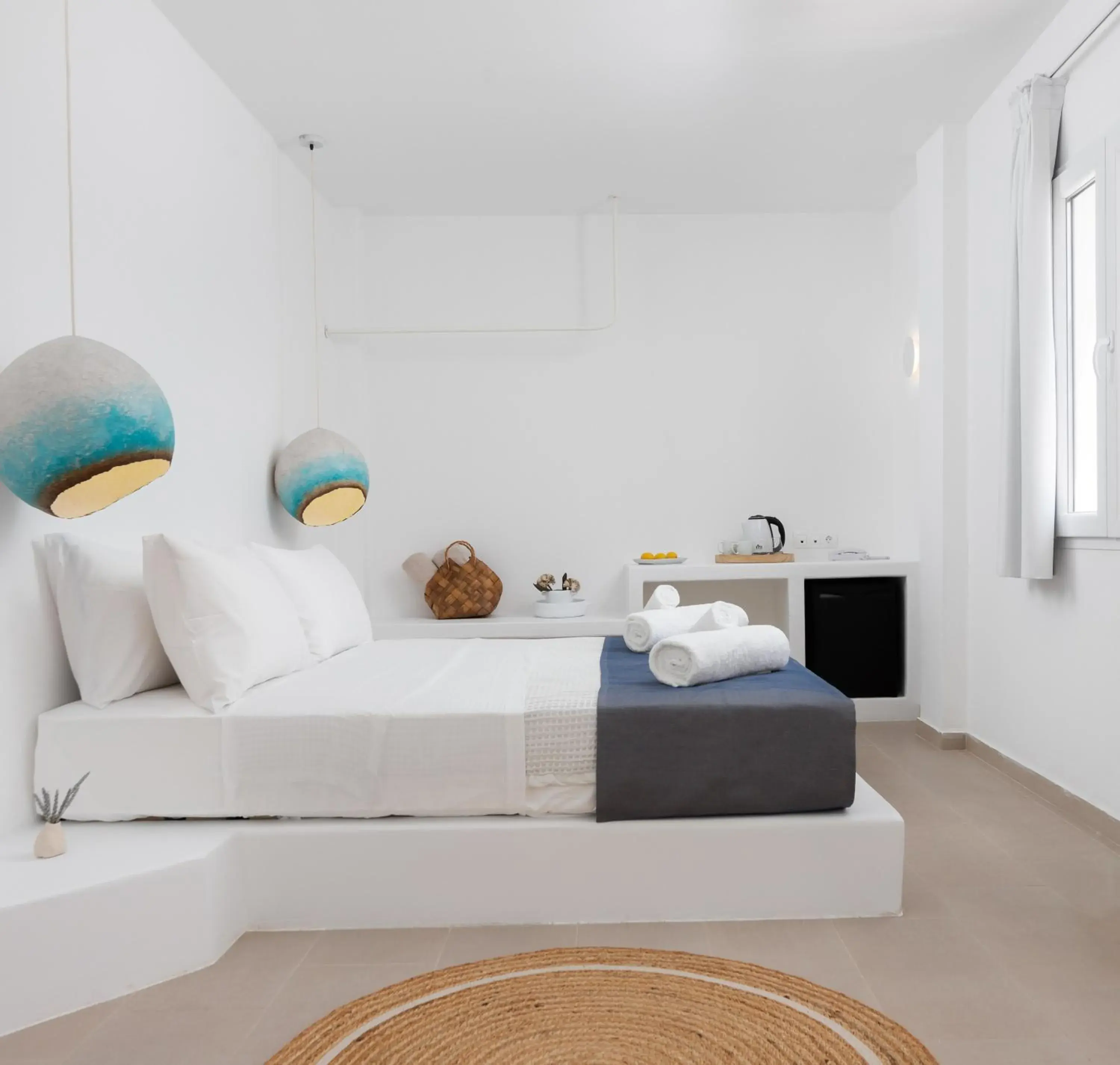 Bed in VOCA HOTEL & SUITES Bed in VOCA HOTEL & SUITES