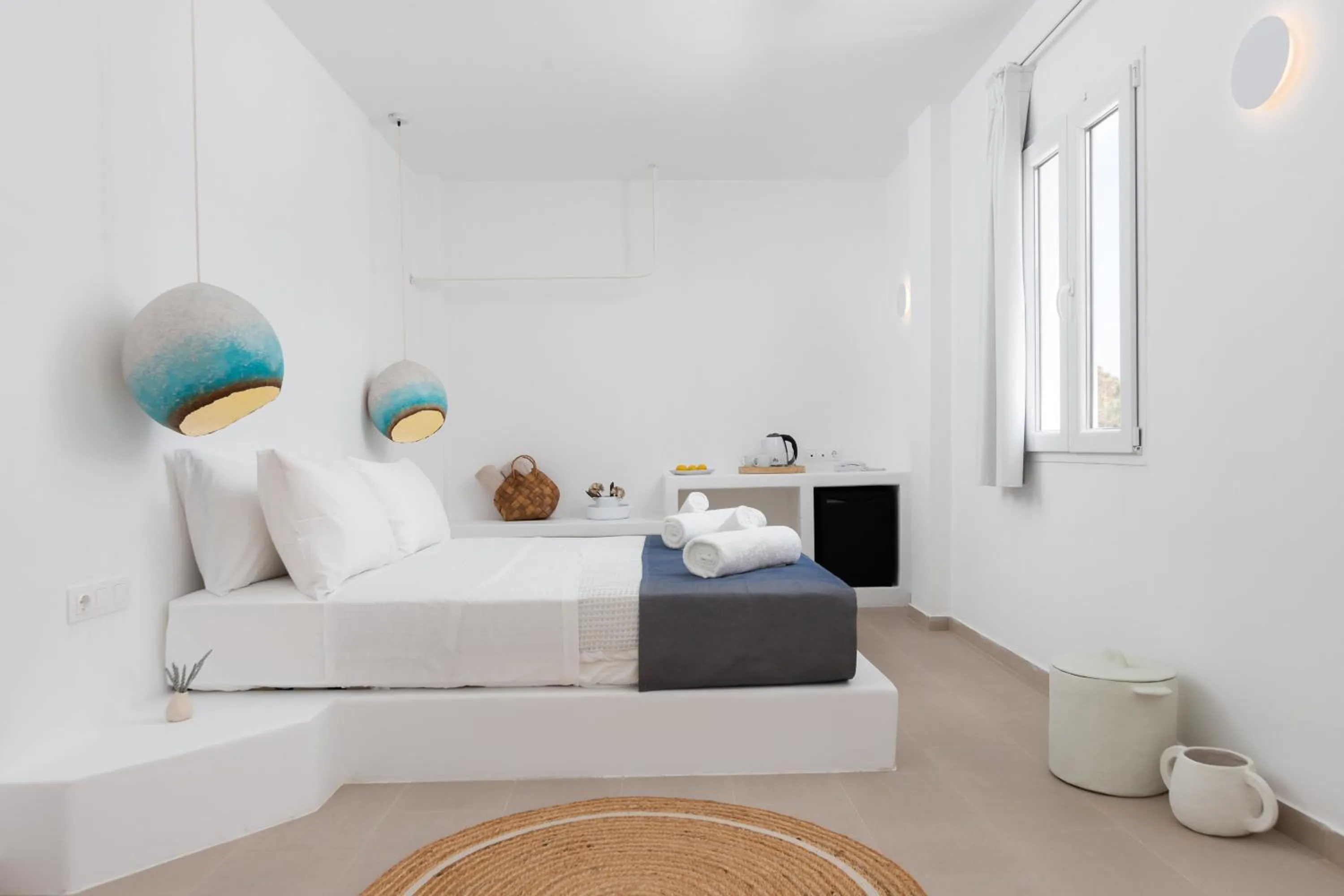 Bed in VOCA HOTEL & SUITES