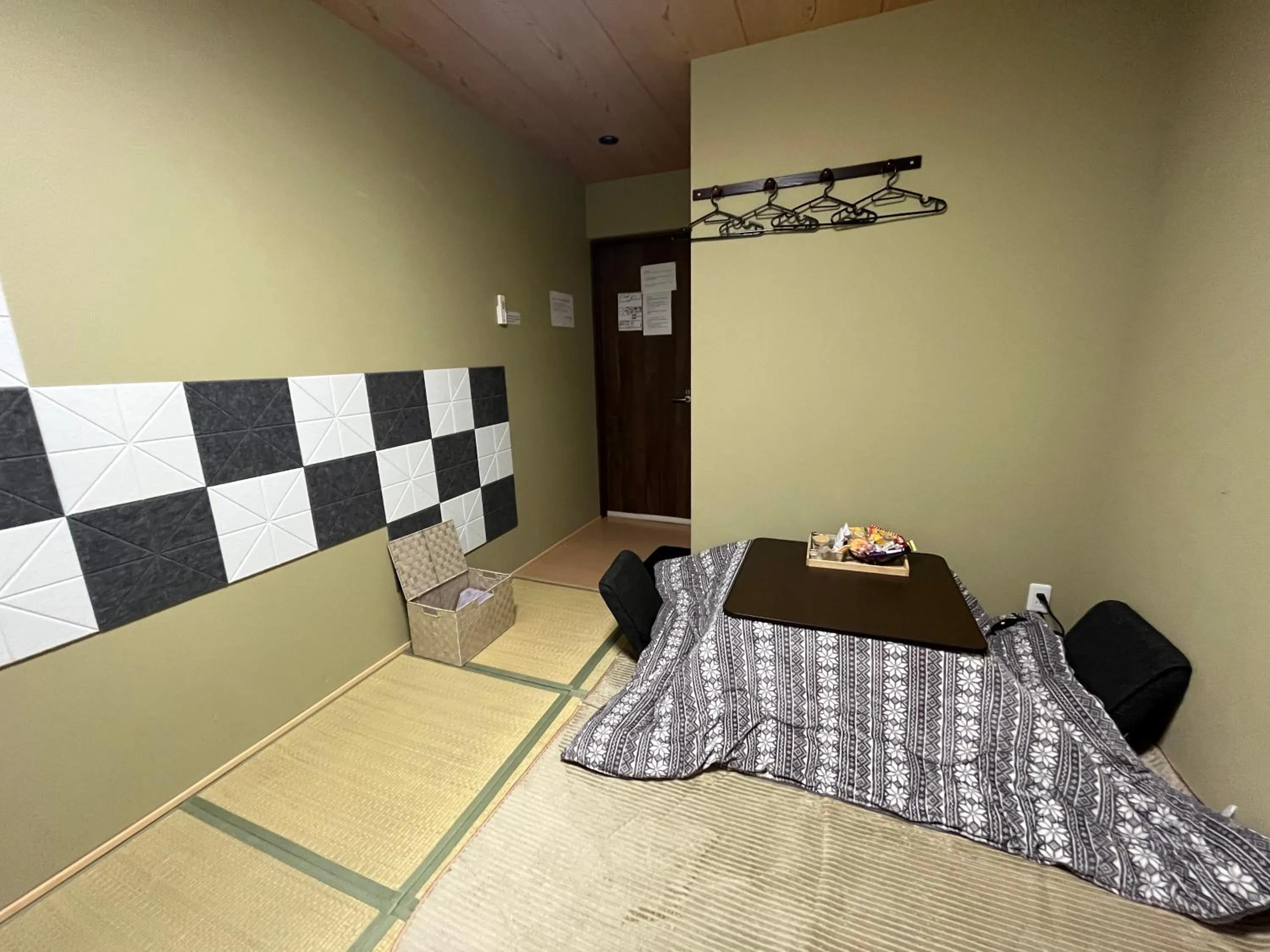 Bed in Wafu Ryokan Uehonmachi