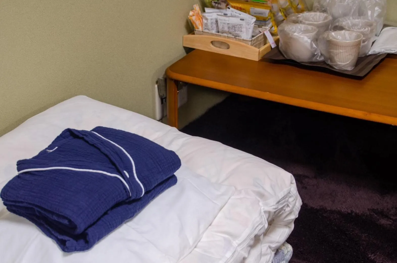 Bed in Wafu Ryokan Uehonmachi