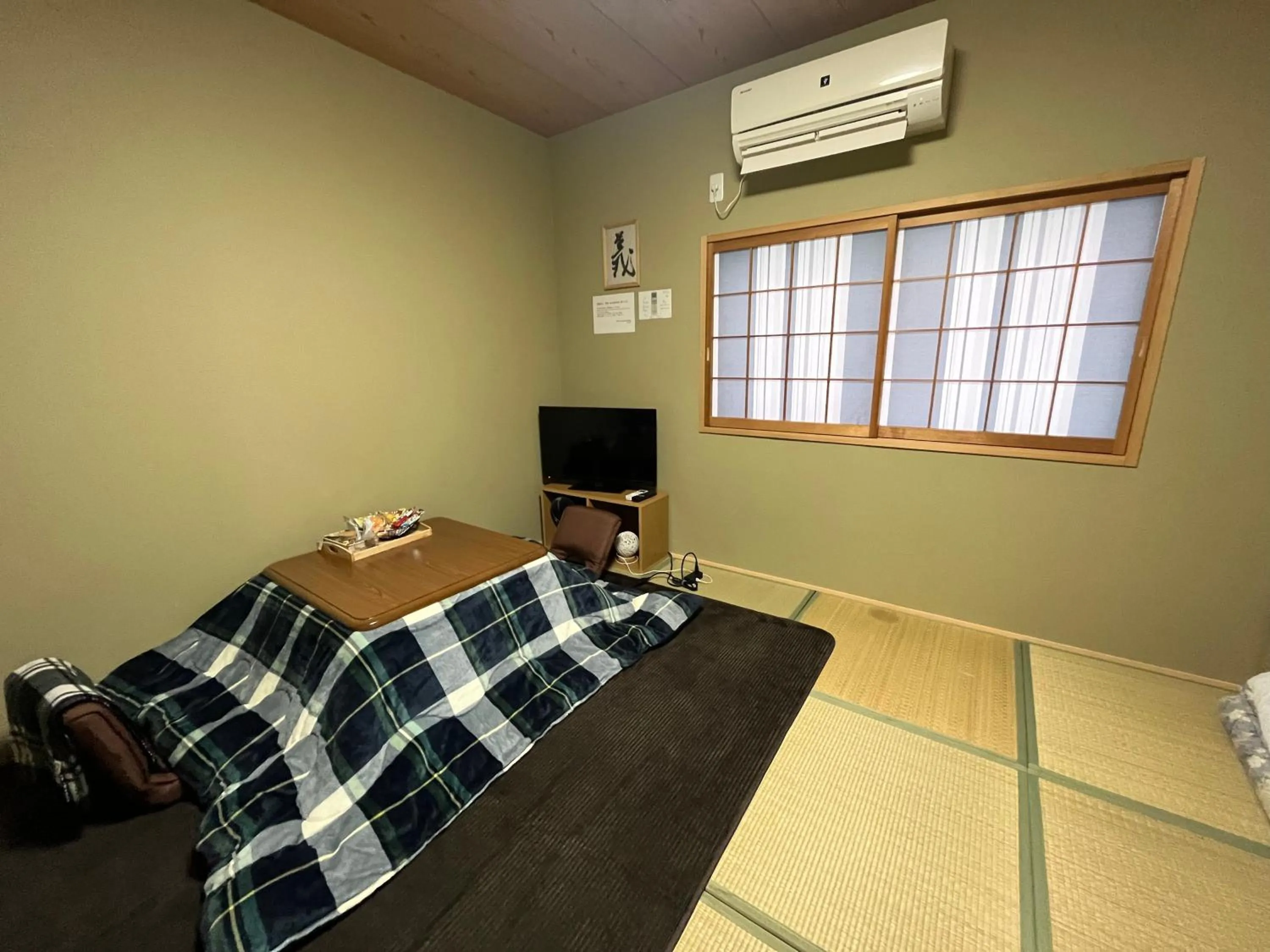 Bed in Wafu Ryokan Uehonmachi