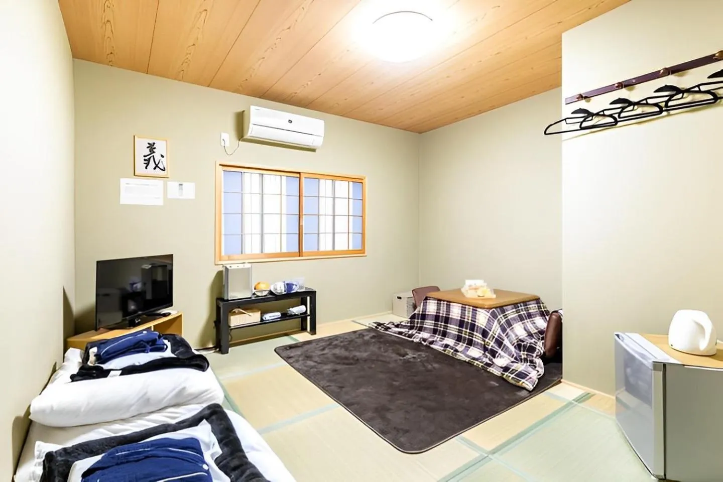 Bed in Wafu Ryokan Uehonmachi