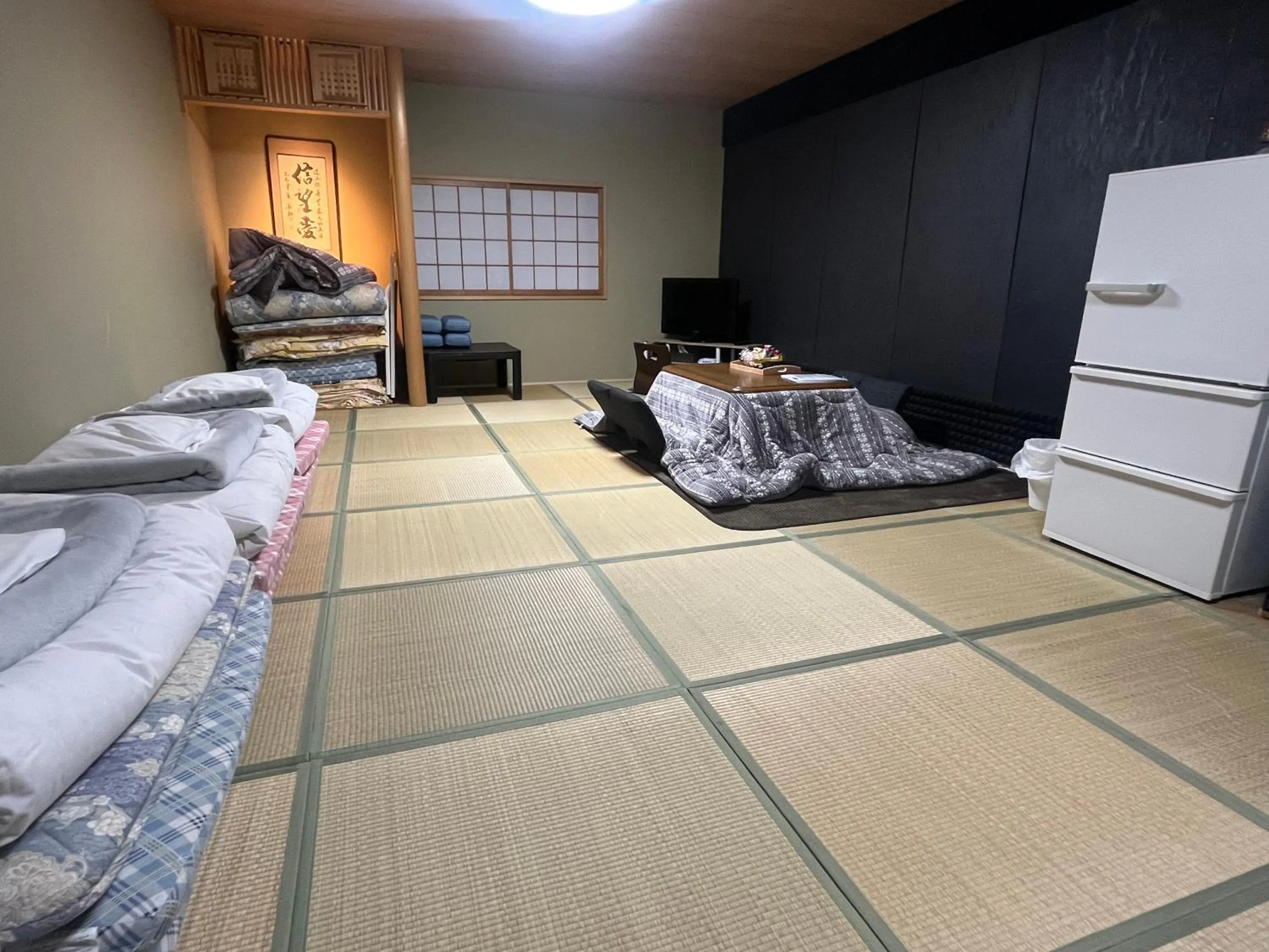 Bed in Wafu Ryokan Uehonmachi