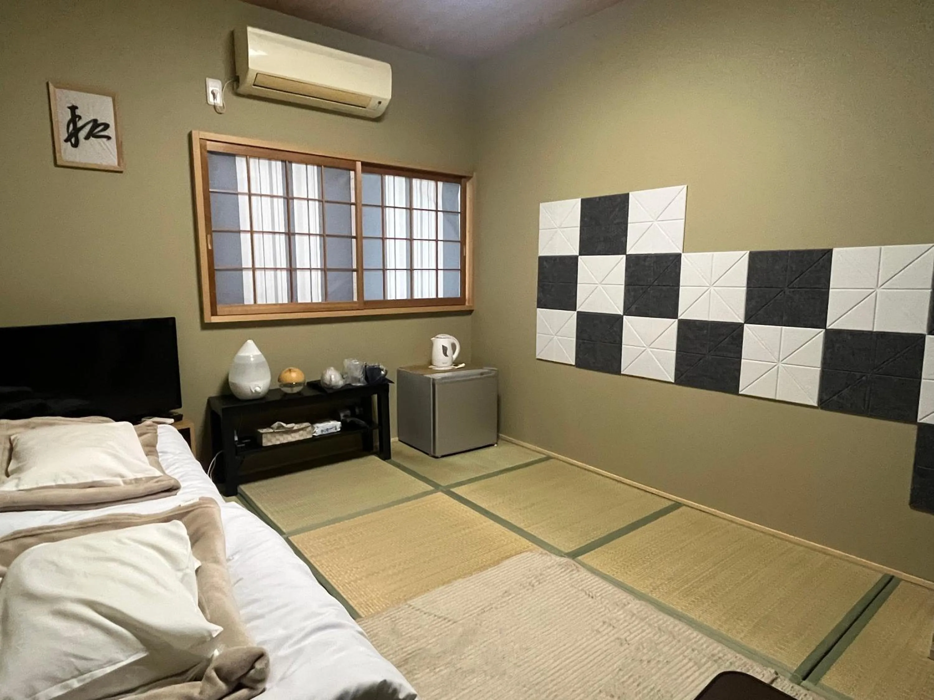 Bed in Wafu Ryokan Uehonmachi