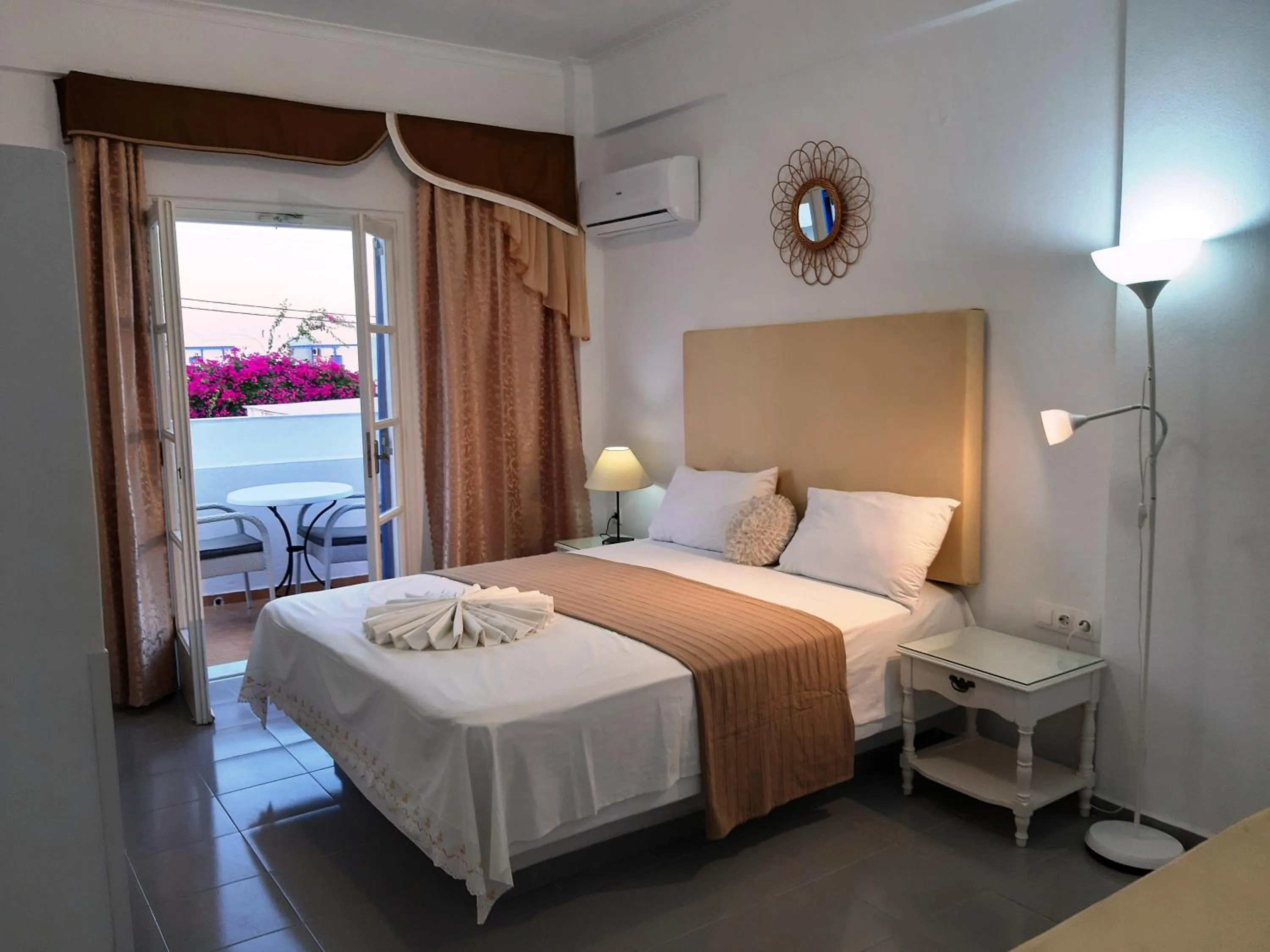 Bed in Atalos Suites