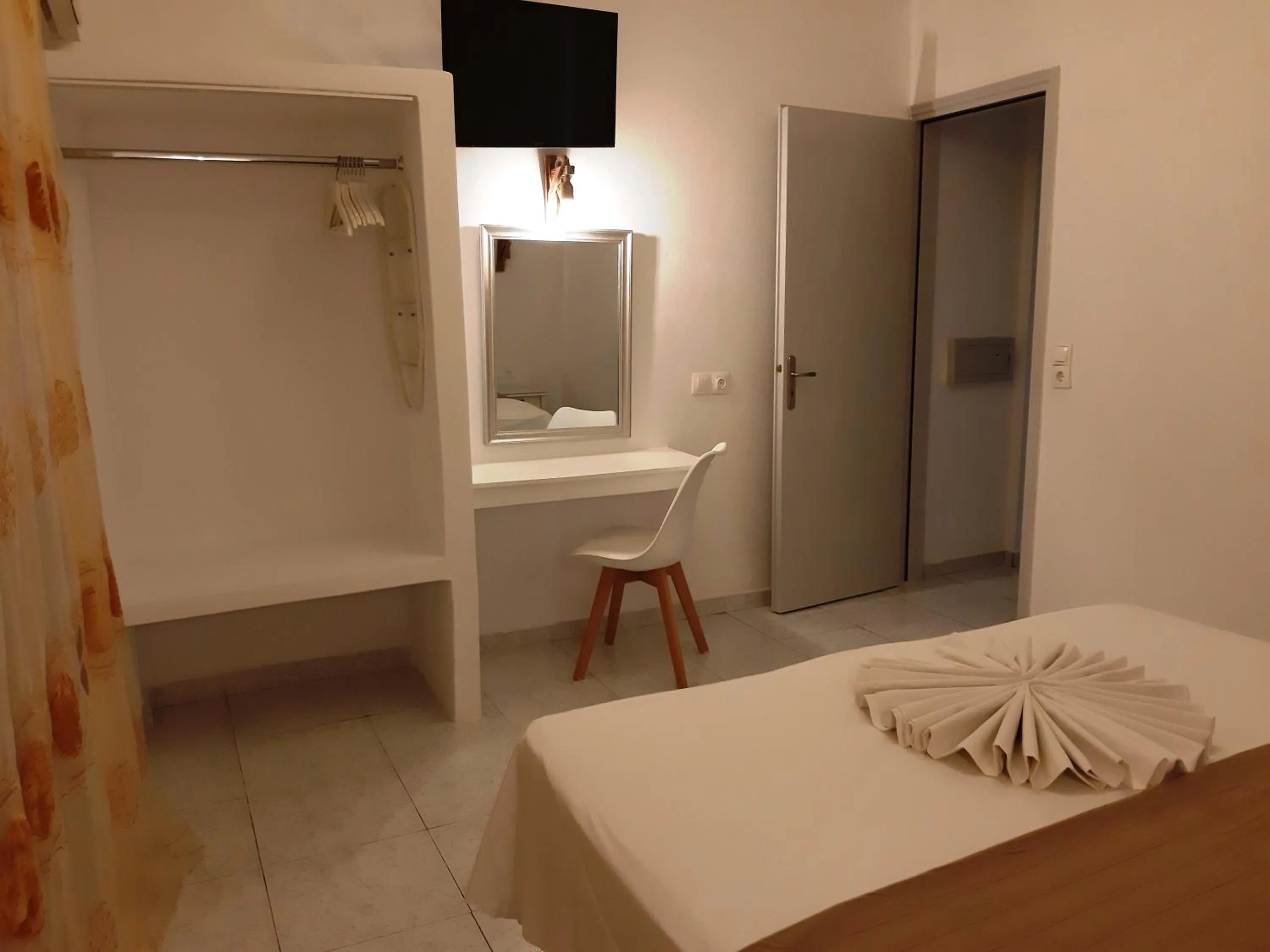 Bed in Atalos Suites