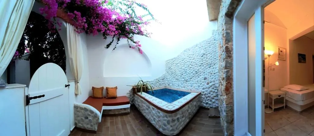 Bed in Atalos Suites