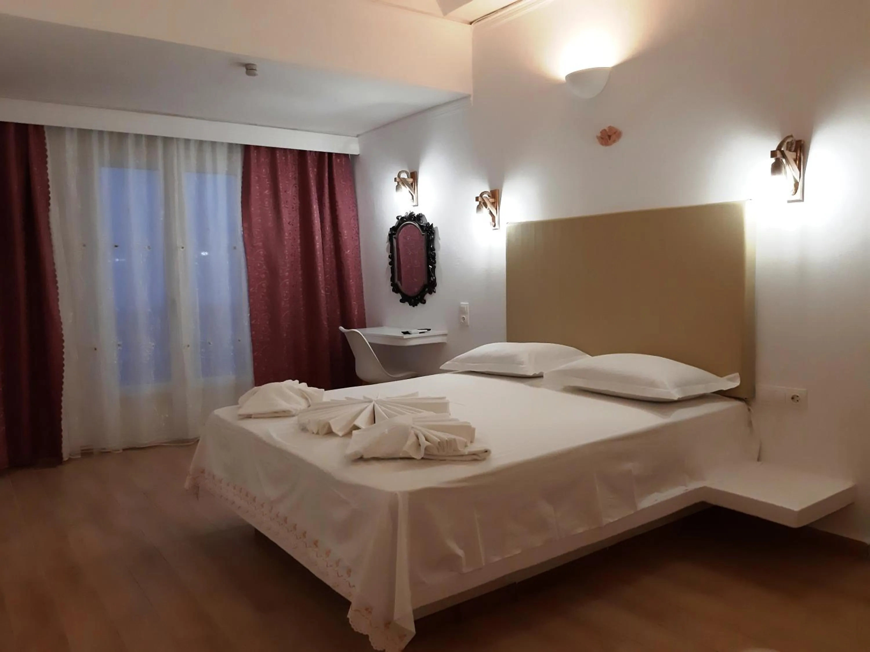 Bed in Atalos Suites