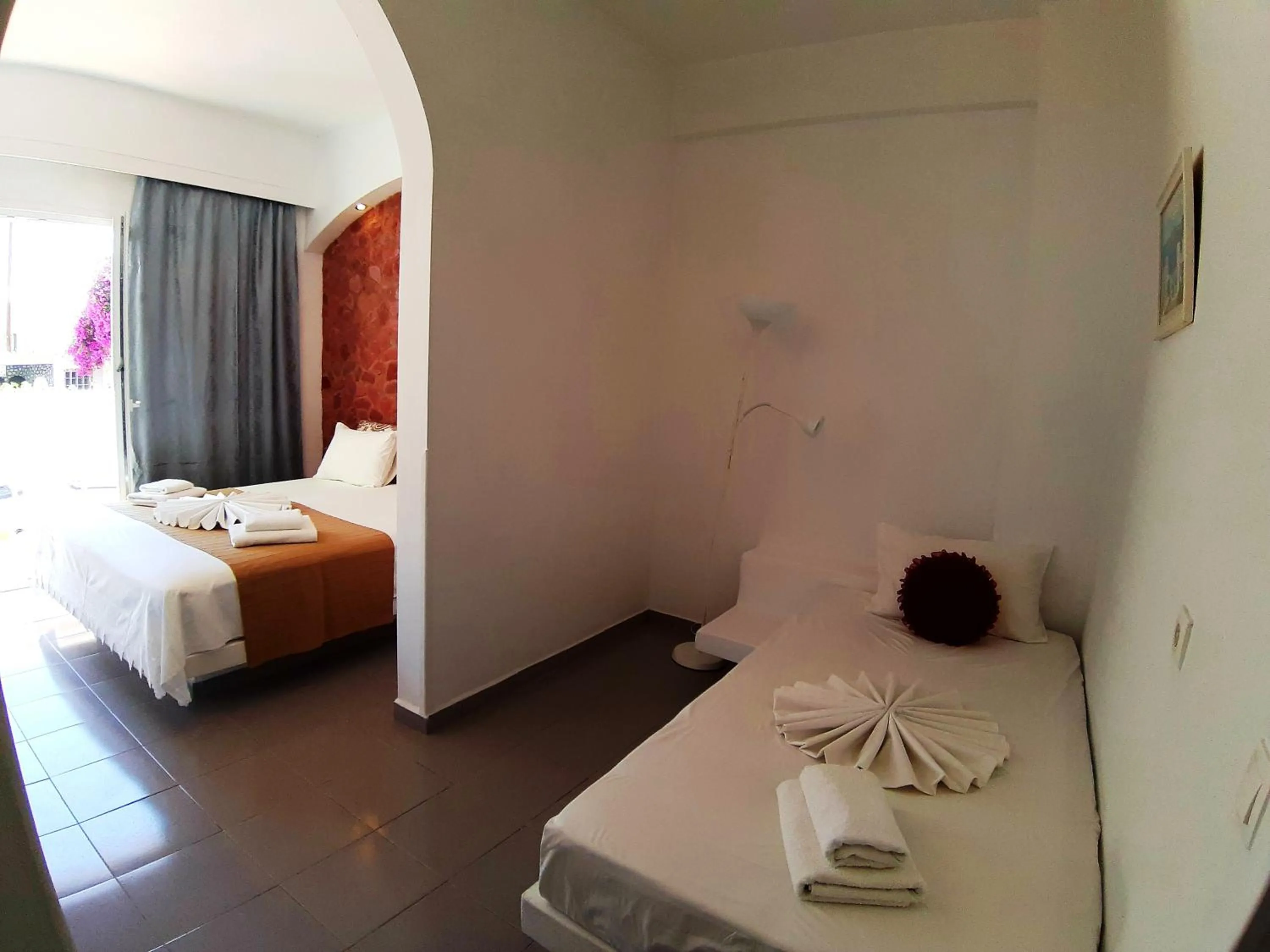 Bed in Atalos Suites