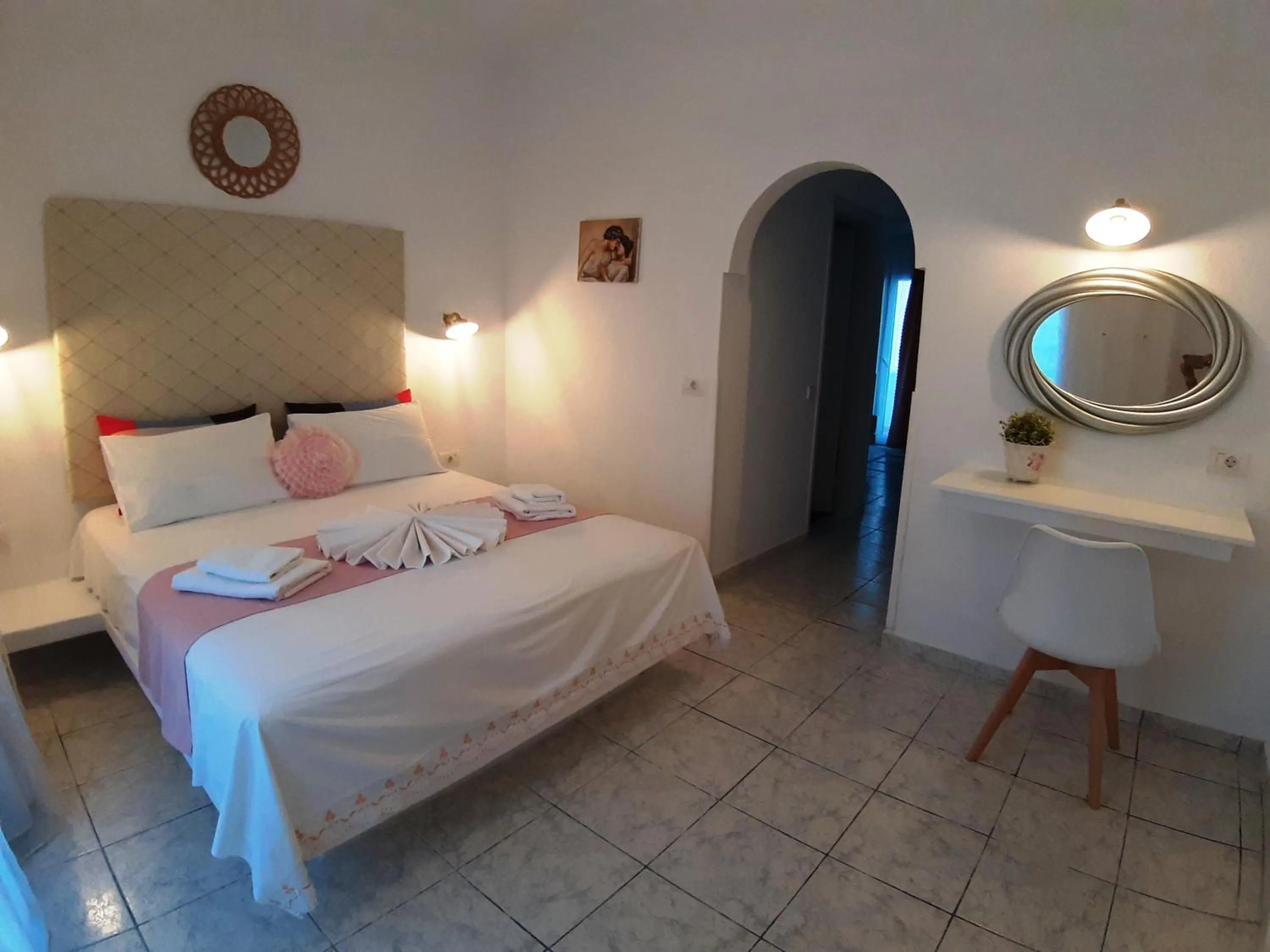 Bed in Atalos Suites