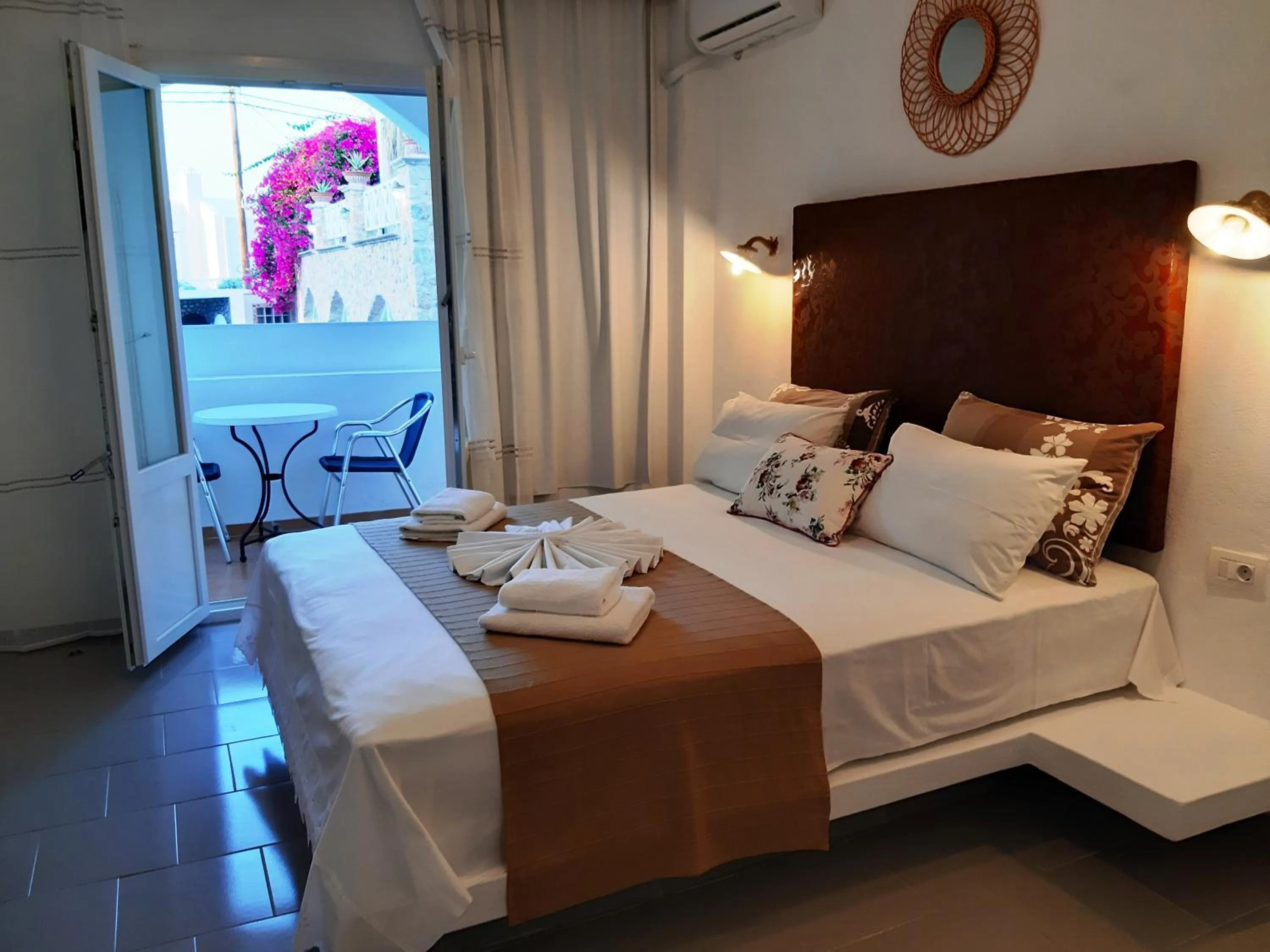 Bed in Atalos Suites