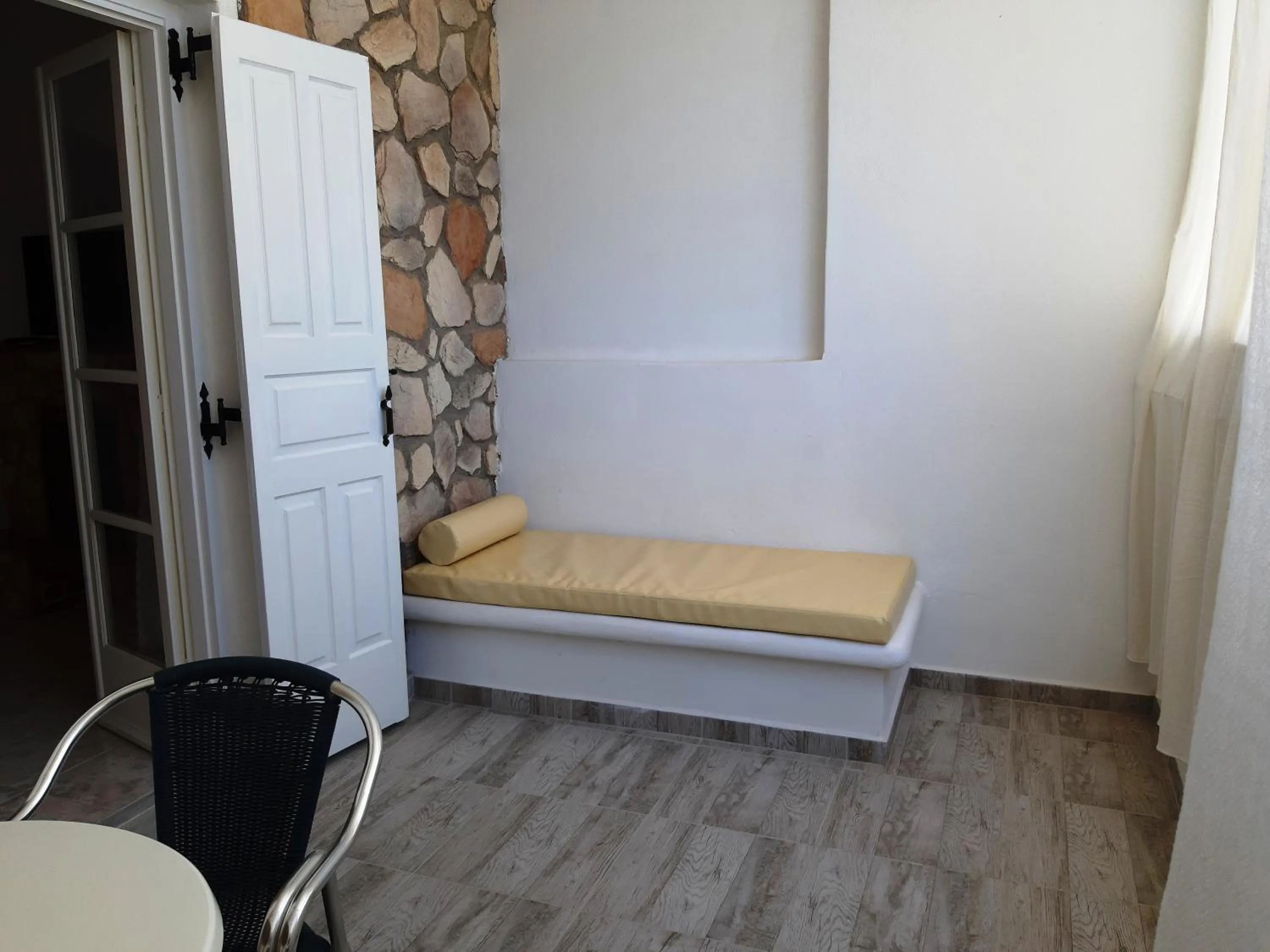 Bed in Atalos Suites