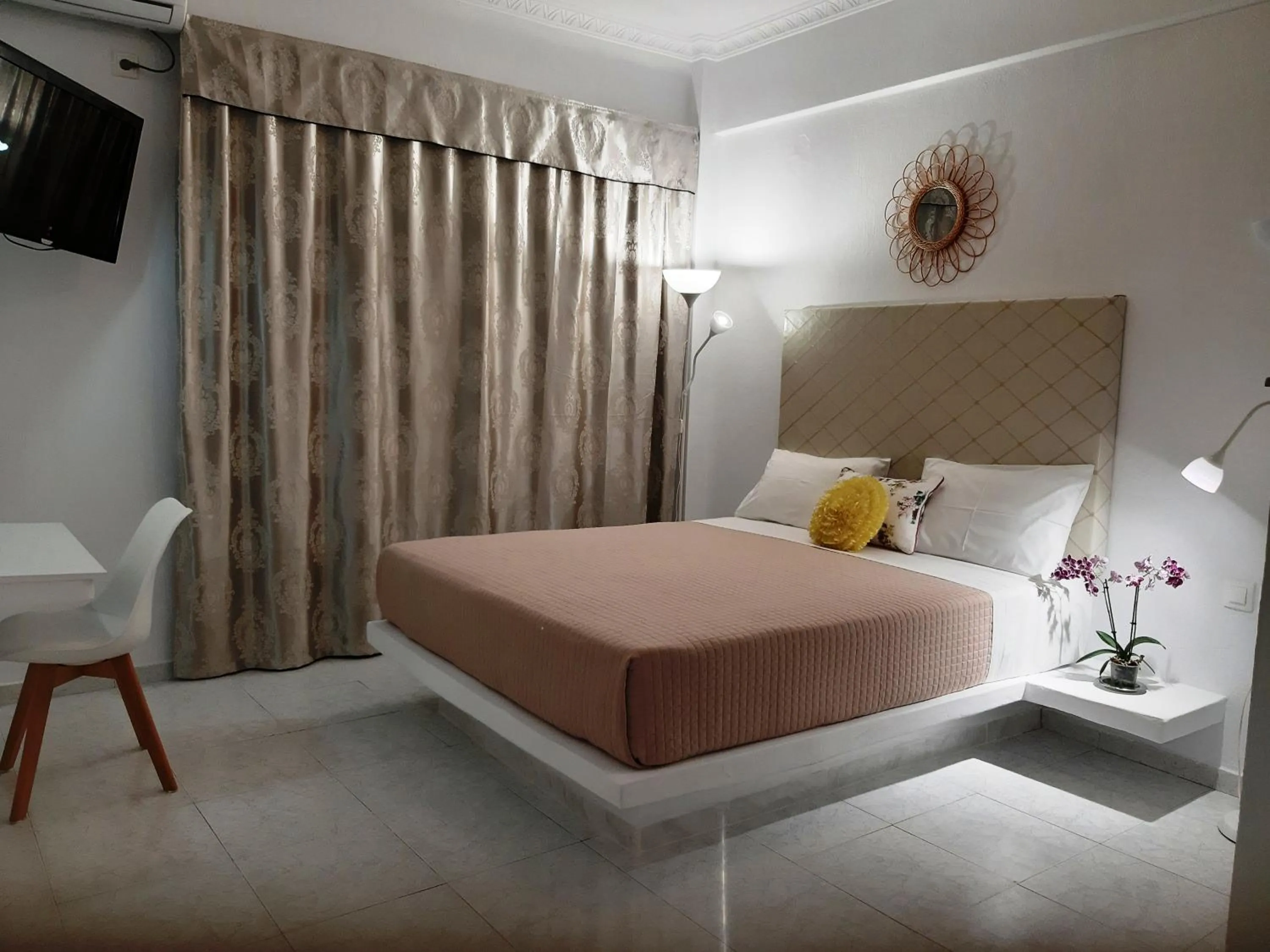 Bed in Atalos Suites