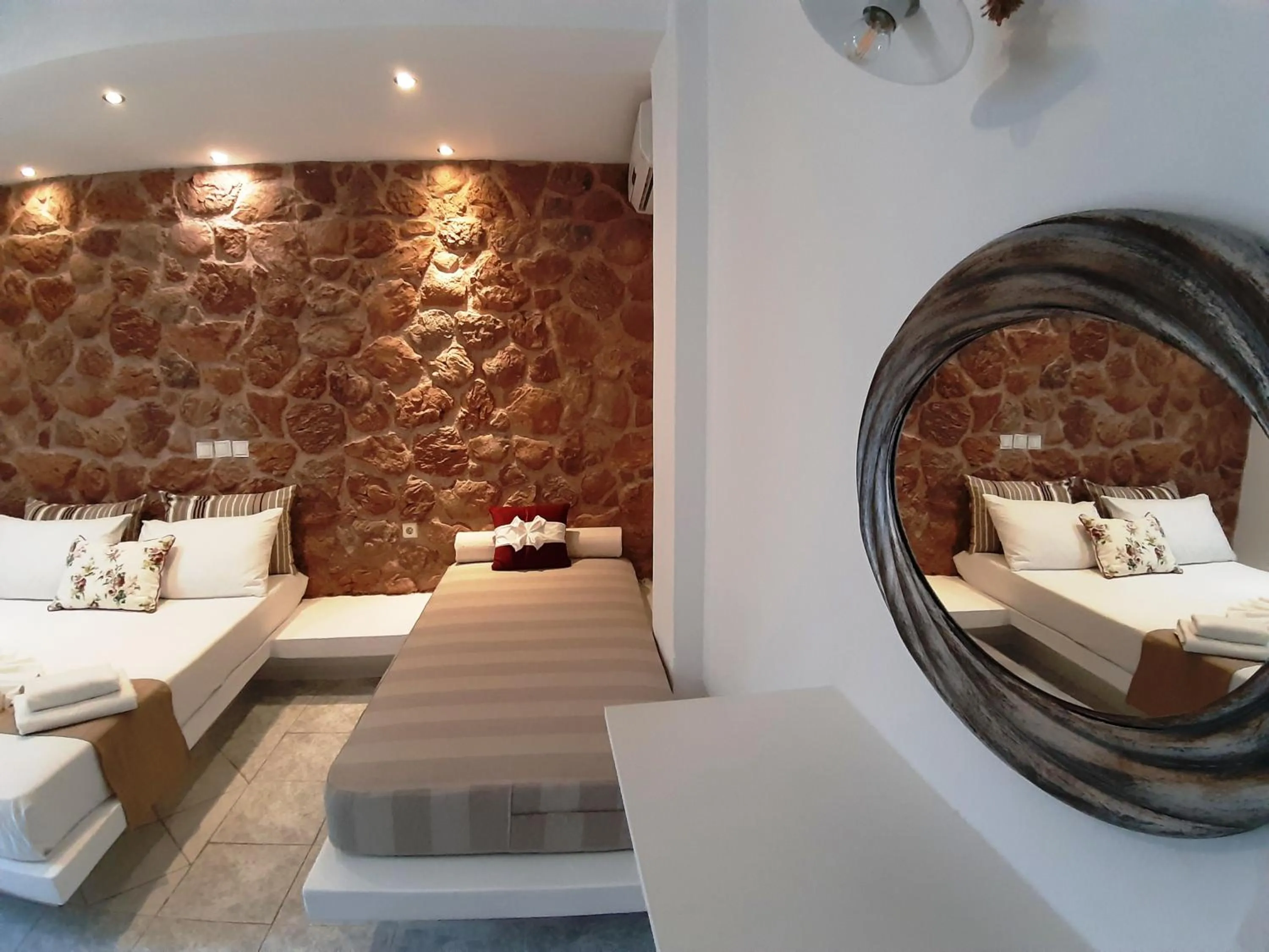 Bed in Atalos Suites