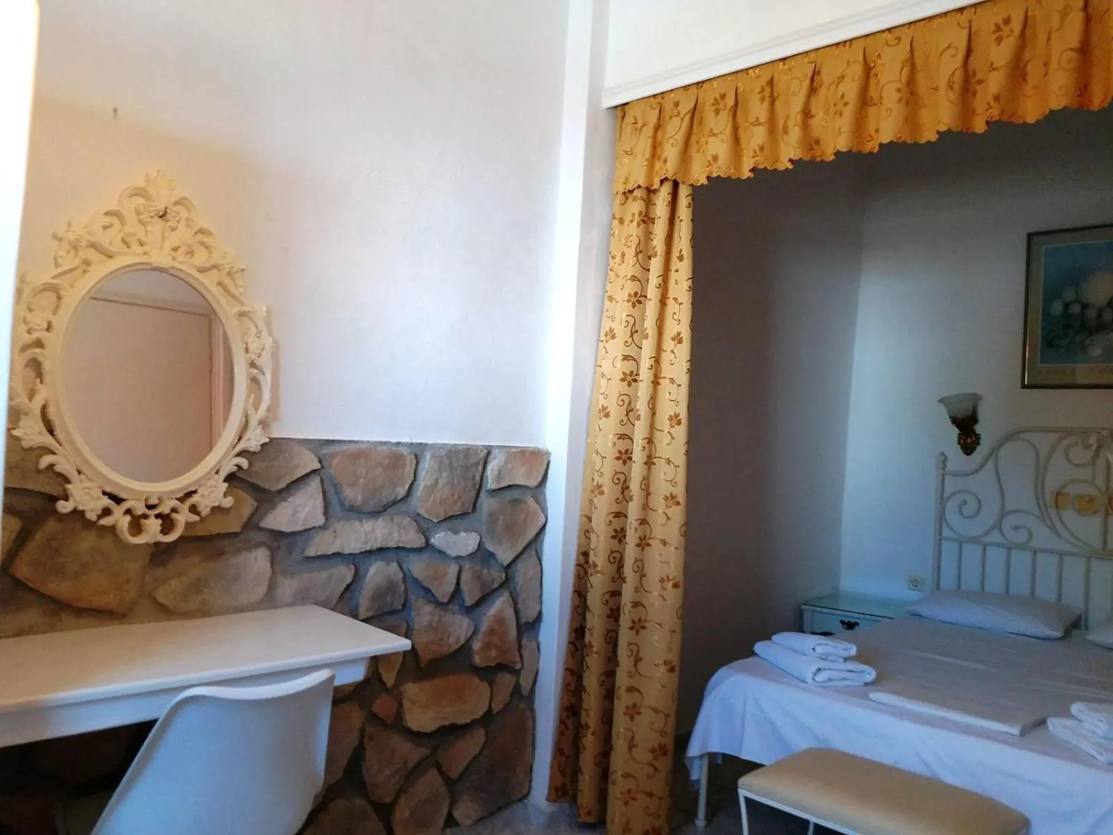 Bed in Atalos Suites