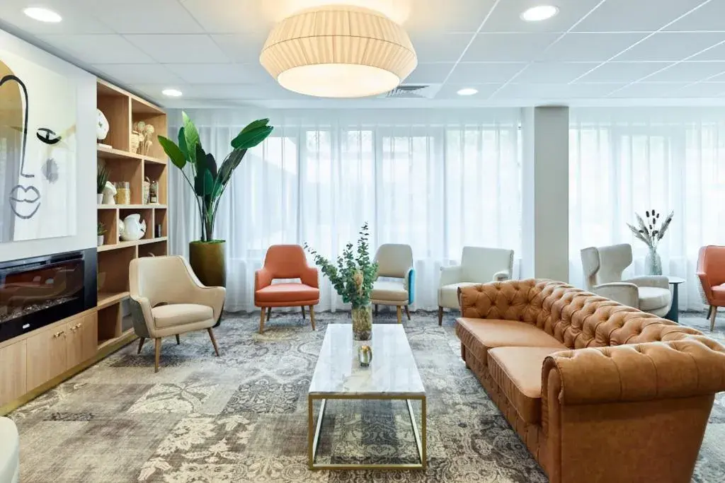 Living room in Zenao Appart'hôtels Suresnes Living room in Zenao Appart'hôtels Suresnes