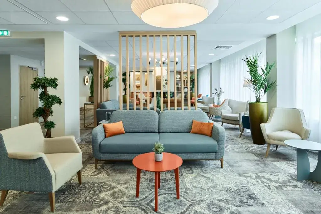 Living room in Zenao Appart'hôtels Suresnes Living room in Zenao Appart'hôtels Suresnes