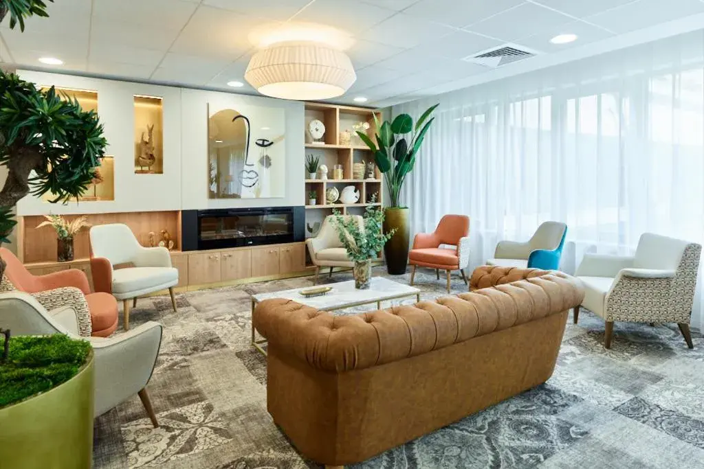 Living room in Zenao Appart'hôtels Suresnes Living room in Zenao Appart'hôtels Suresnes