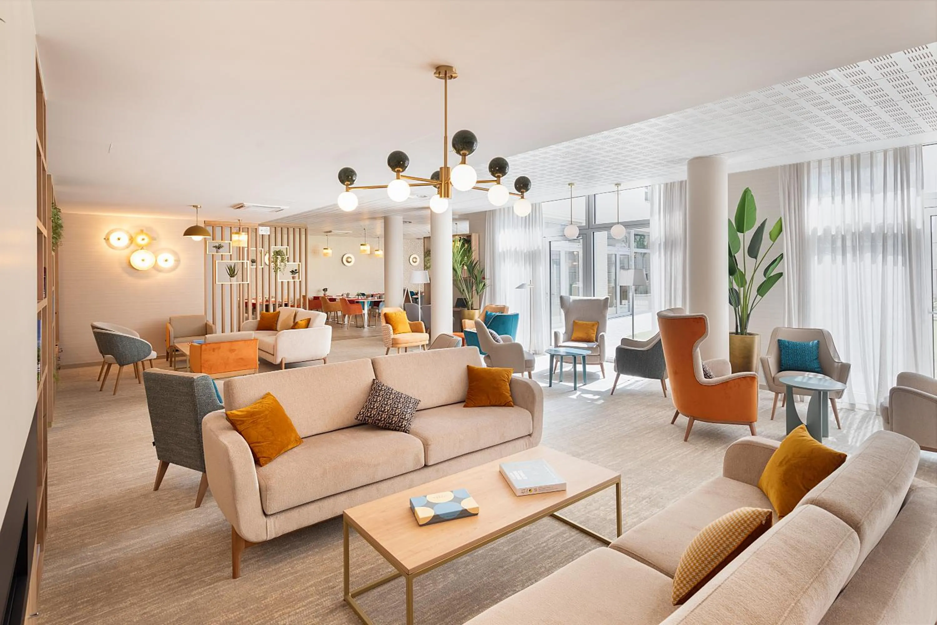 Communal lounge/ TV room in Zenao Appart'hôtels Montreuil