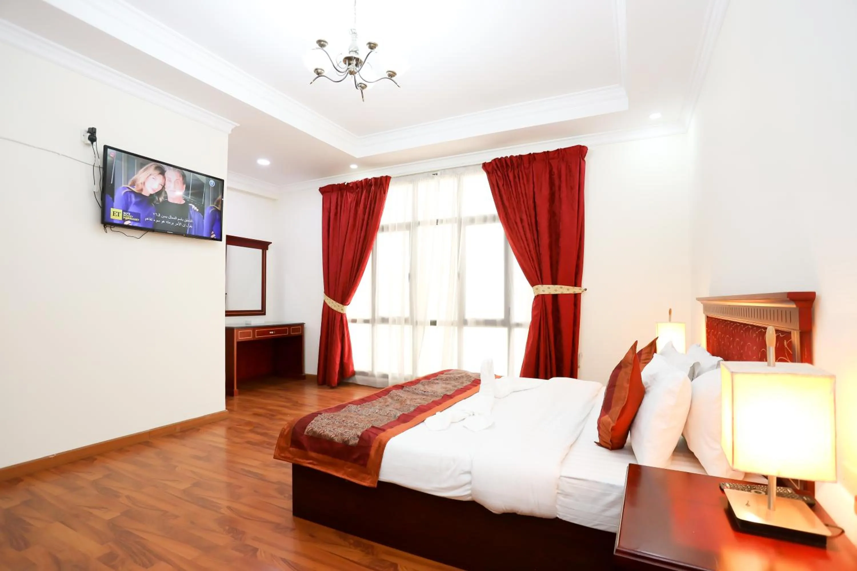 Bed in Pearl Bahrain Suites