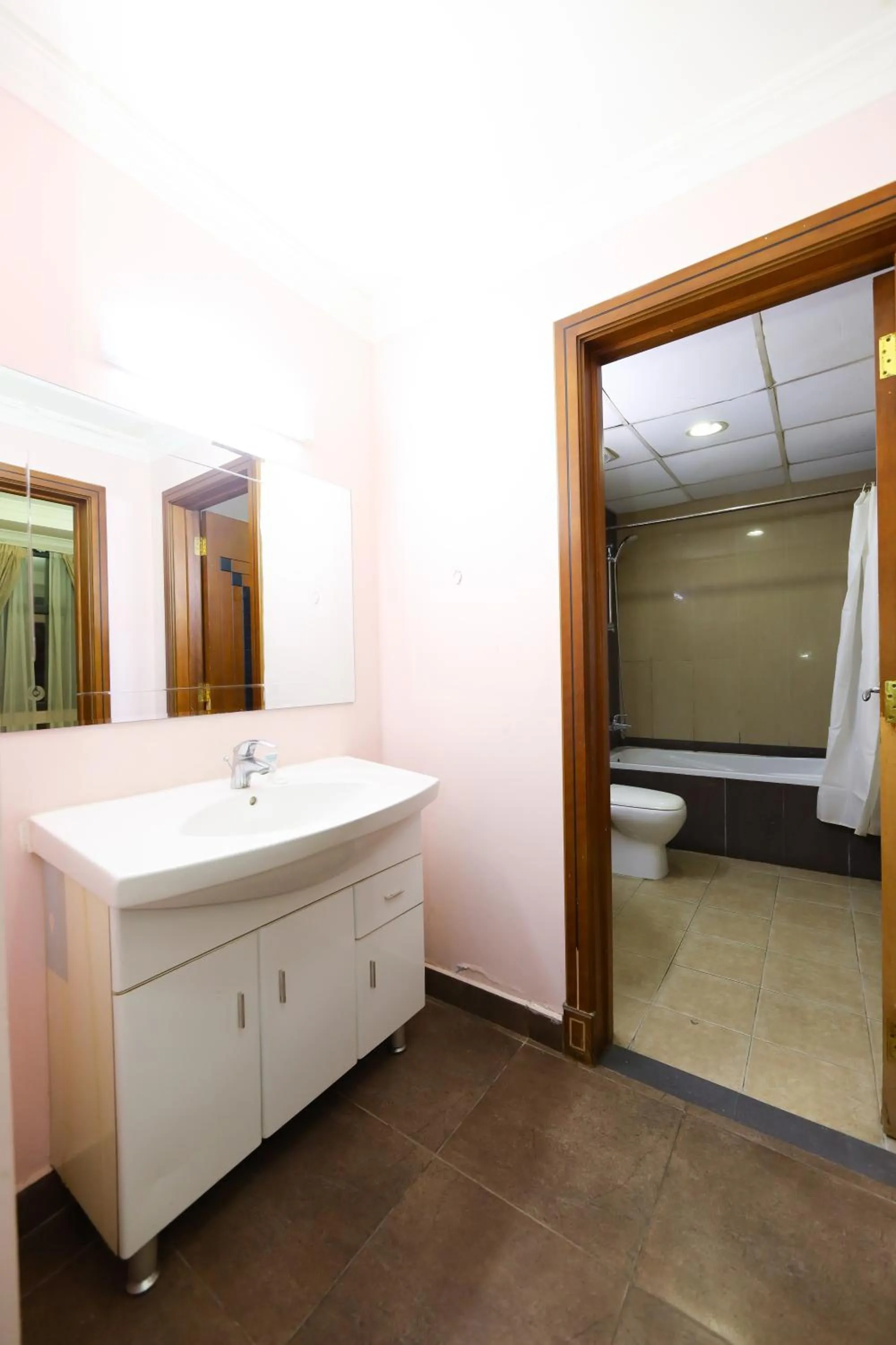 Toilet in Pearl Bahrain Suites