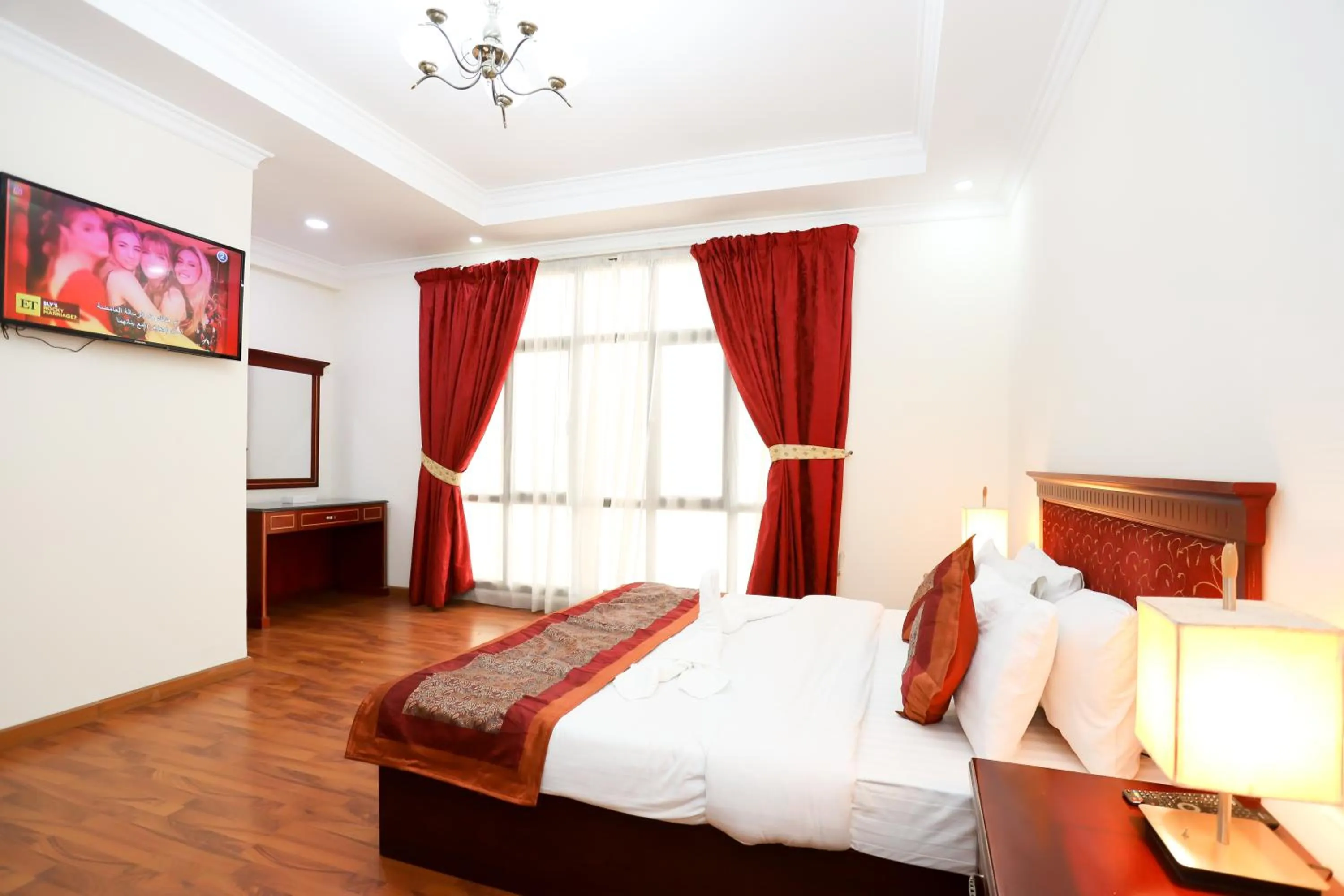 Bed in Pearl Bahrain Suites