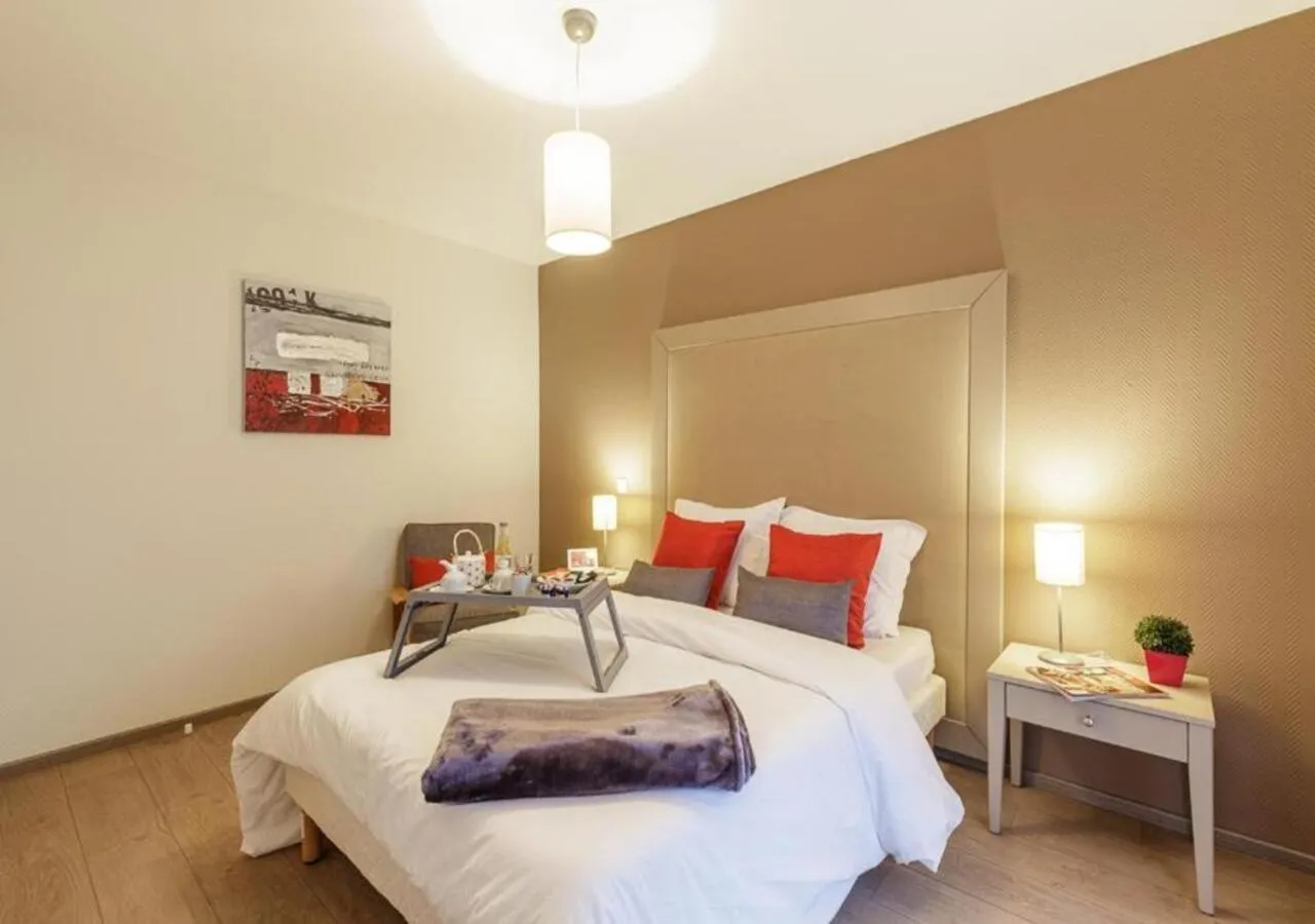 Bed in Zenao Appart'hôtels Strasbourg