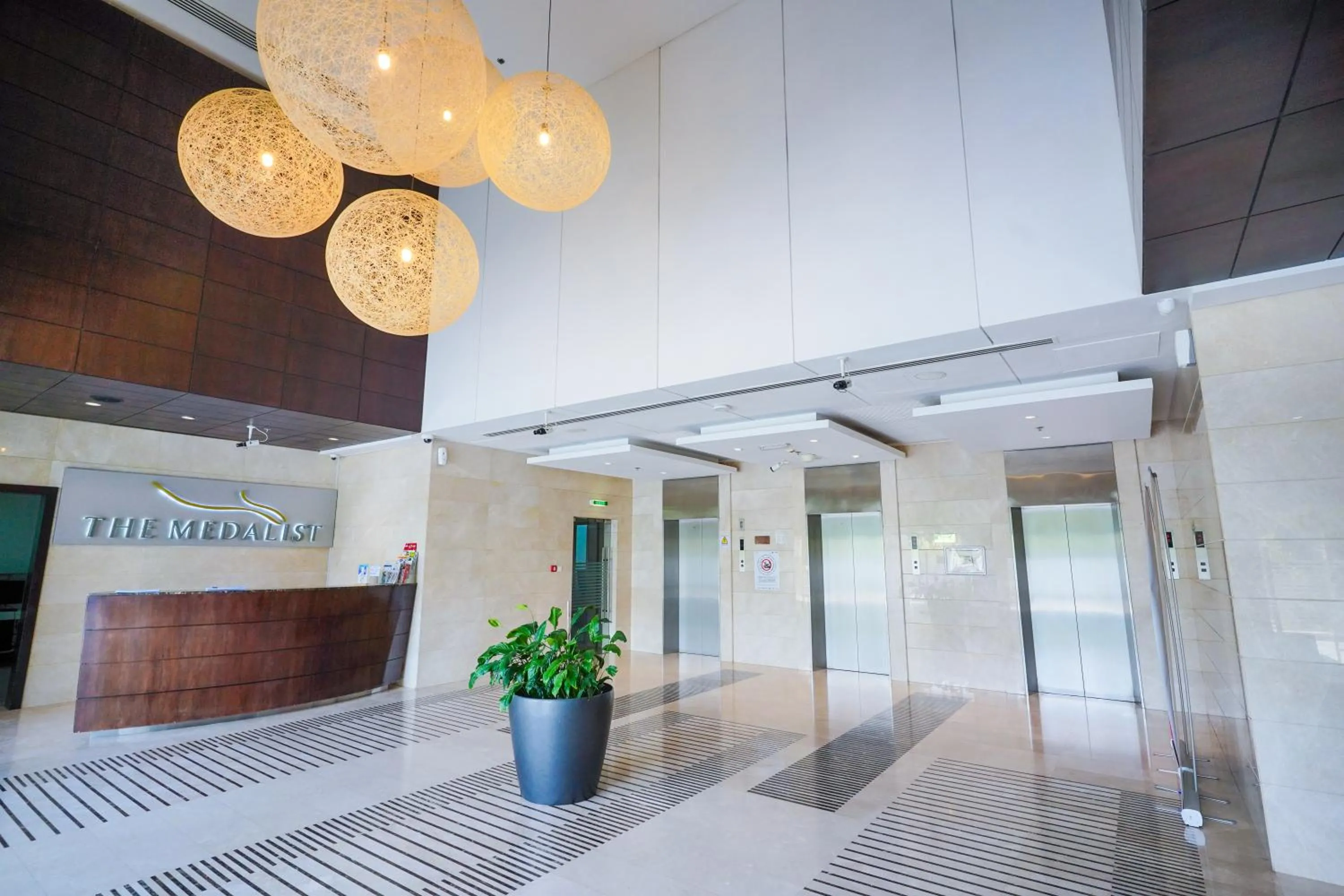 Lobby or reception in Unique 1BR Apartment in Sport City