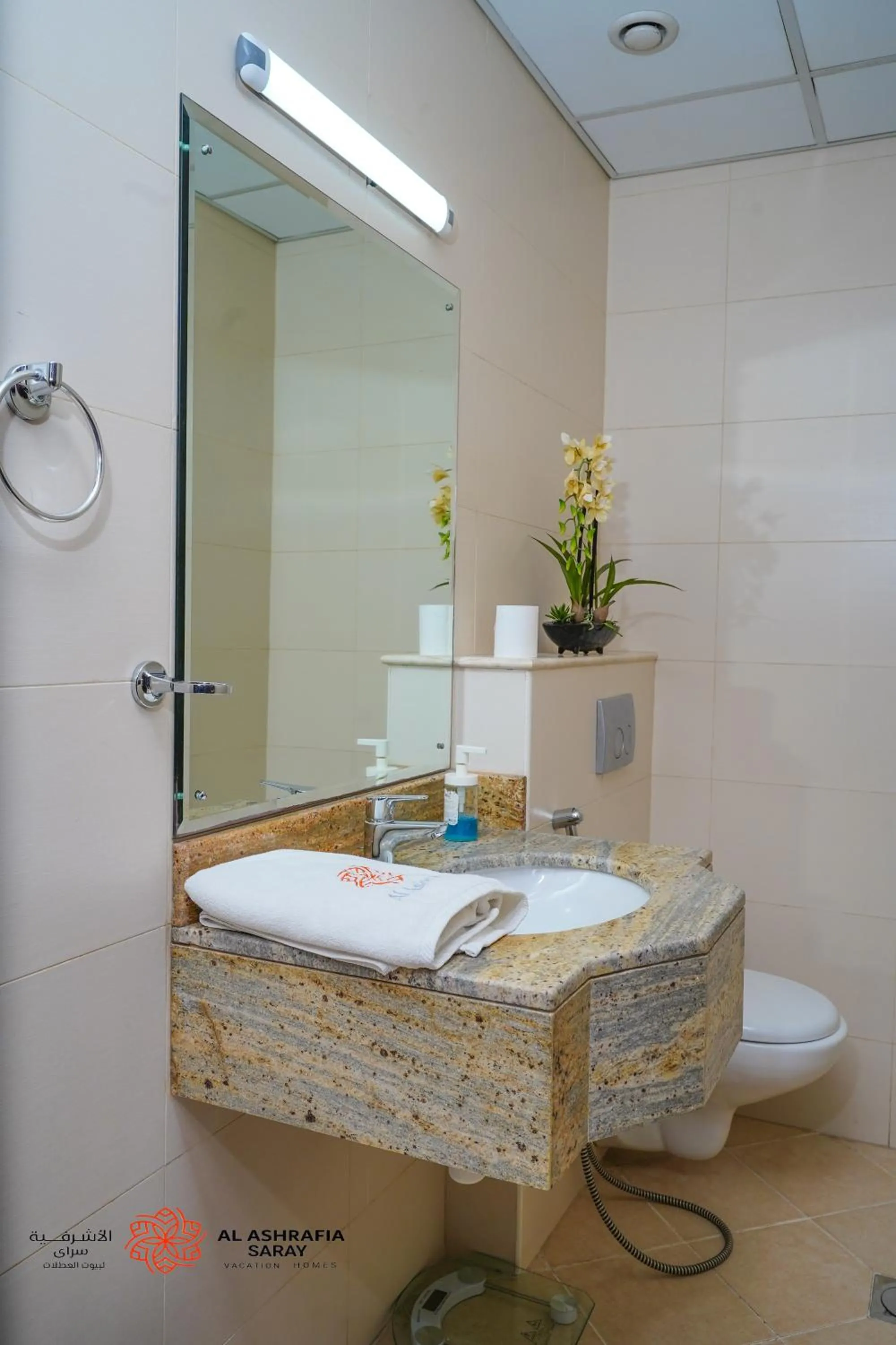 Toilet in Unique 1BR Apartment in Sport City