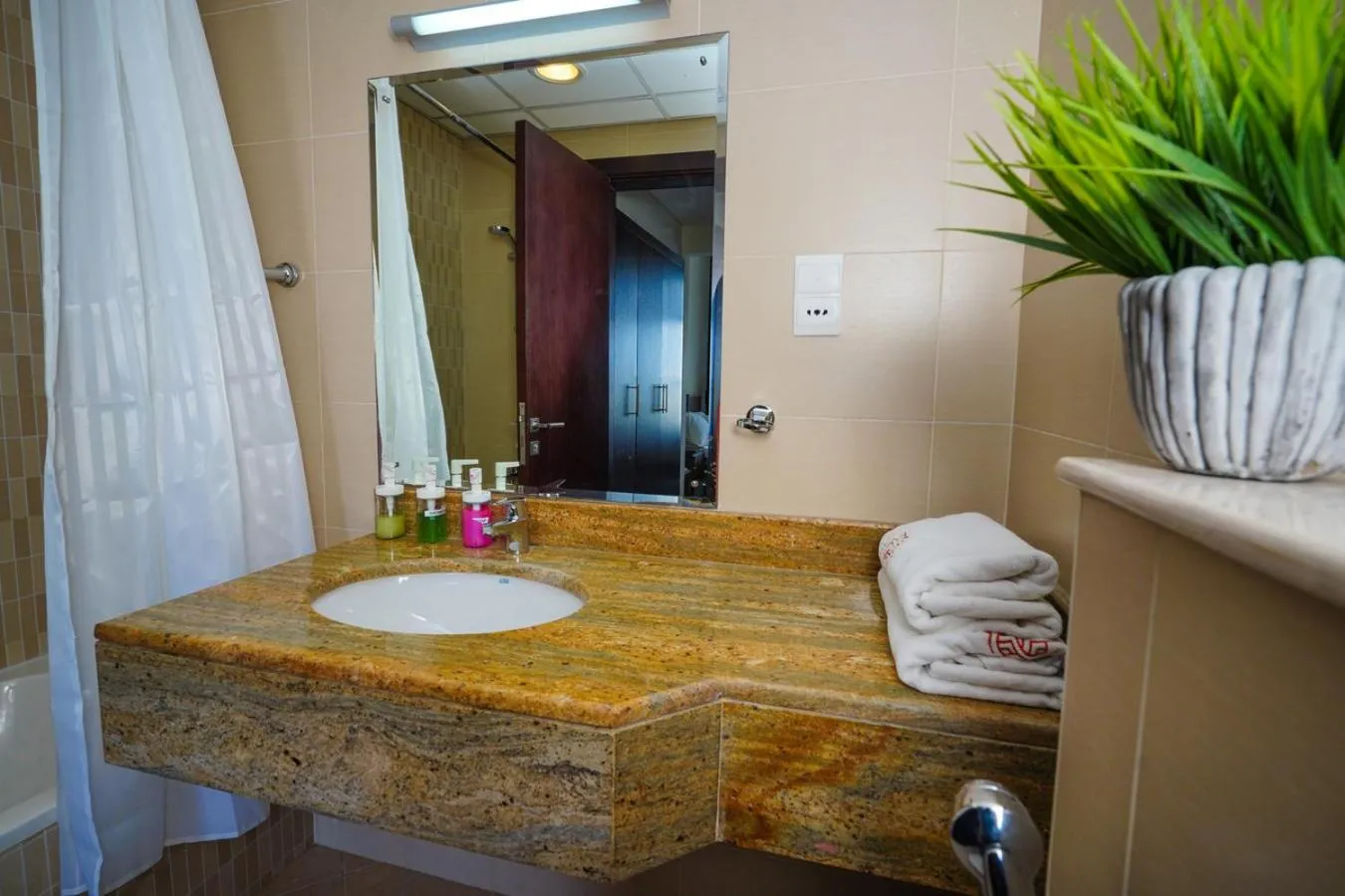 Bathroom in Unique 1BR Apartment in Sport City