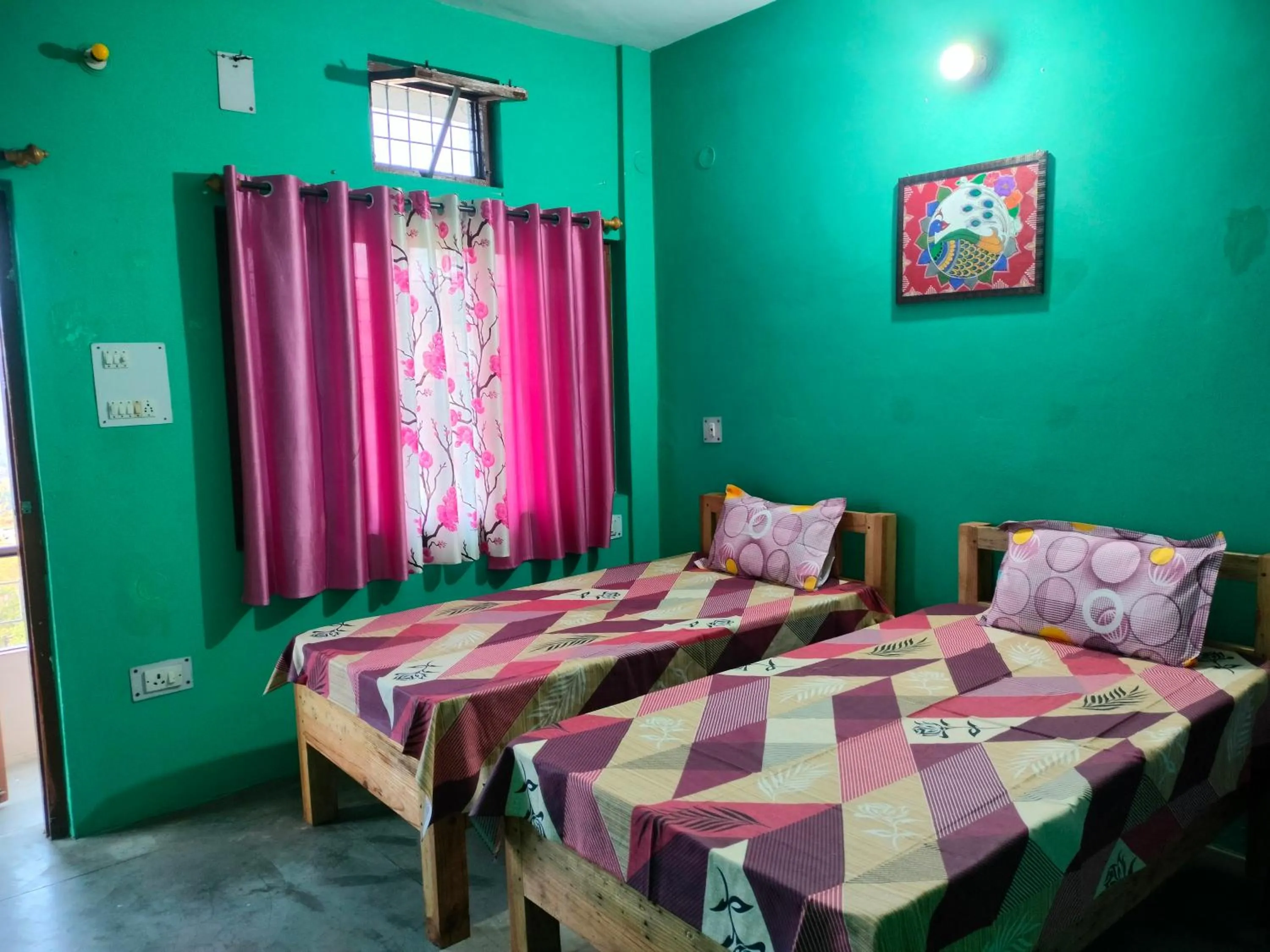 Bed in MangalMurti Himalyan Hotel