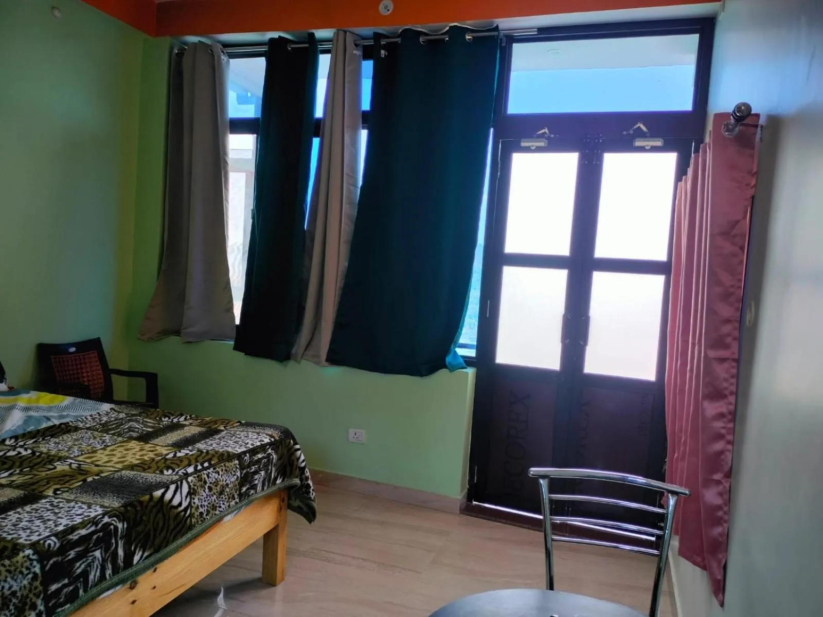 Bed in MangalMurti Himalyan Hotel