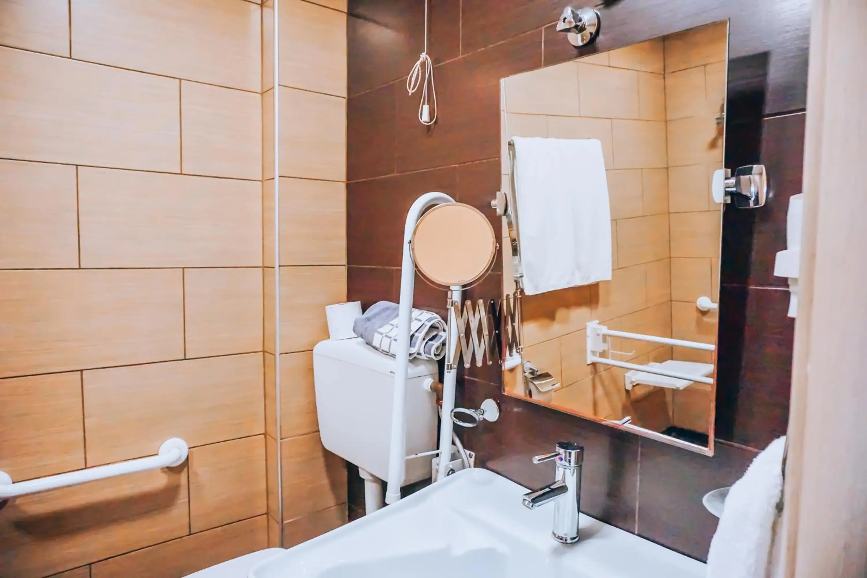 Bathroom in Apollo Resort Art Hotel Bathroom in Apollo Resort Art Hotel