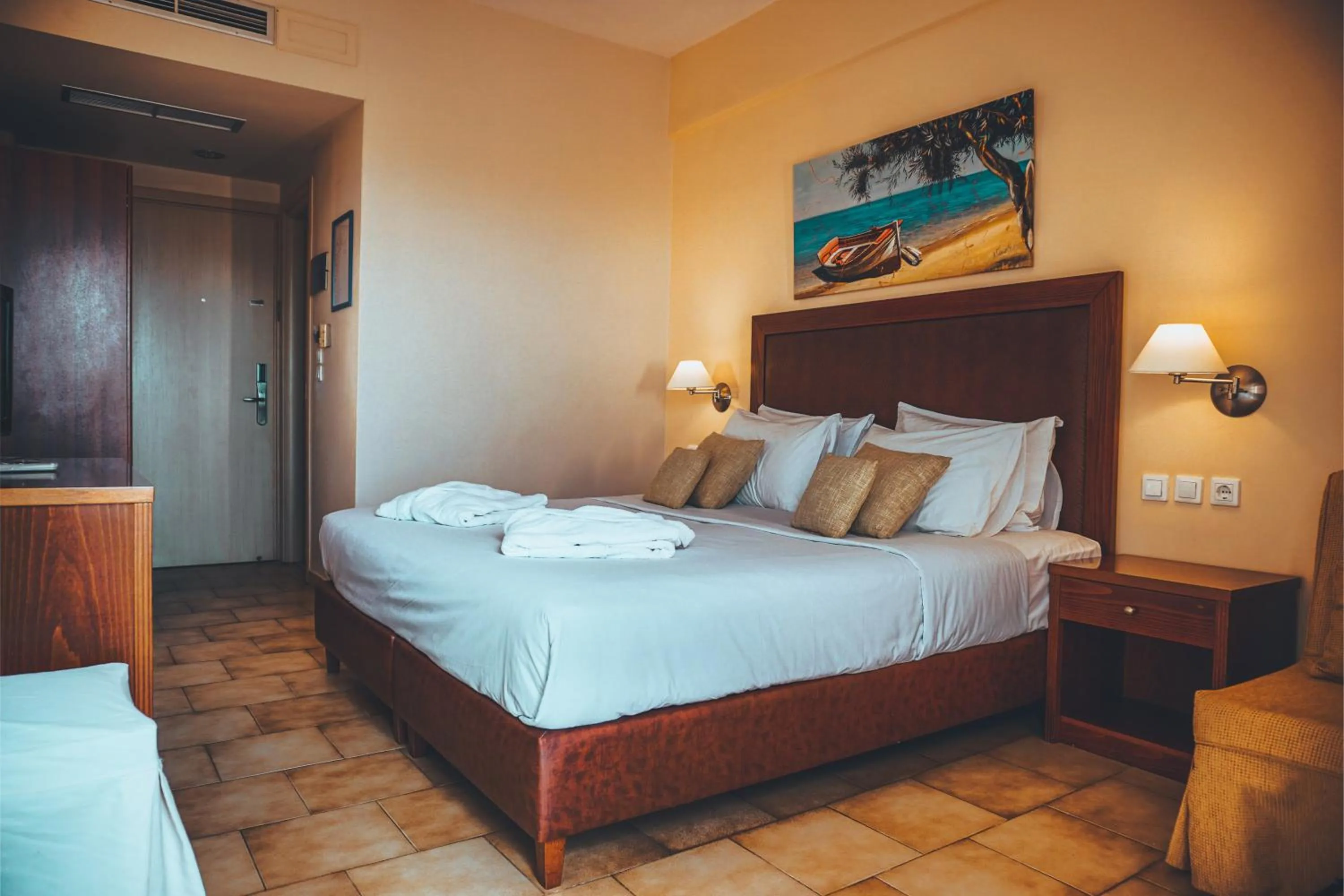 Bed in Apollo Resort Art Hotel